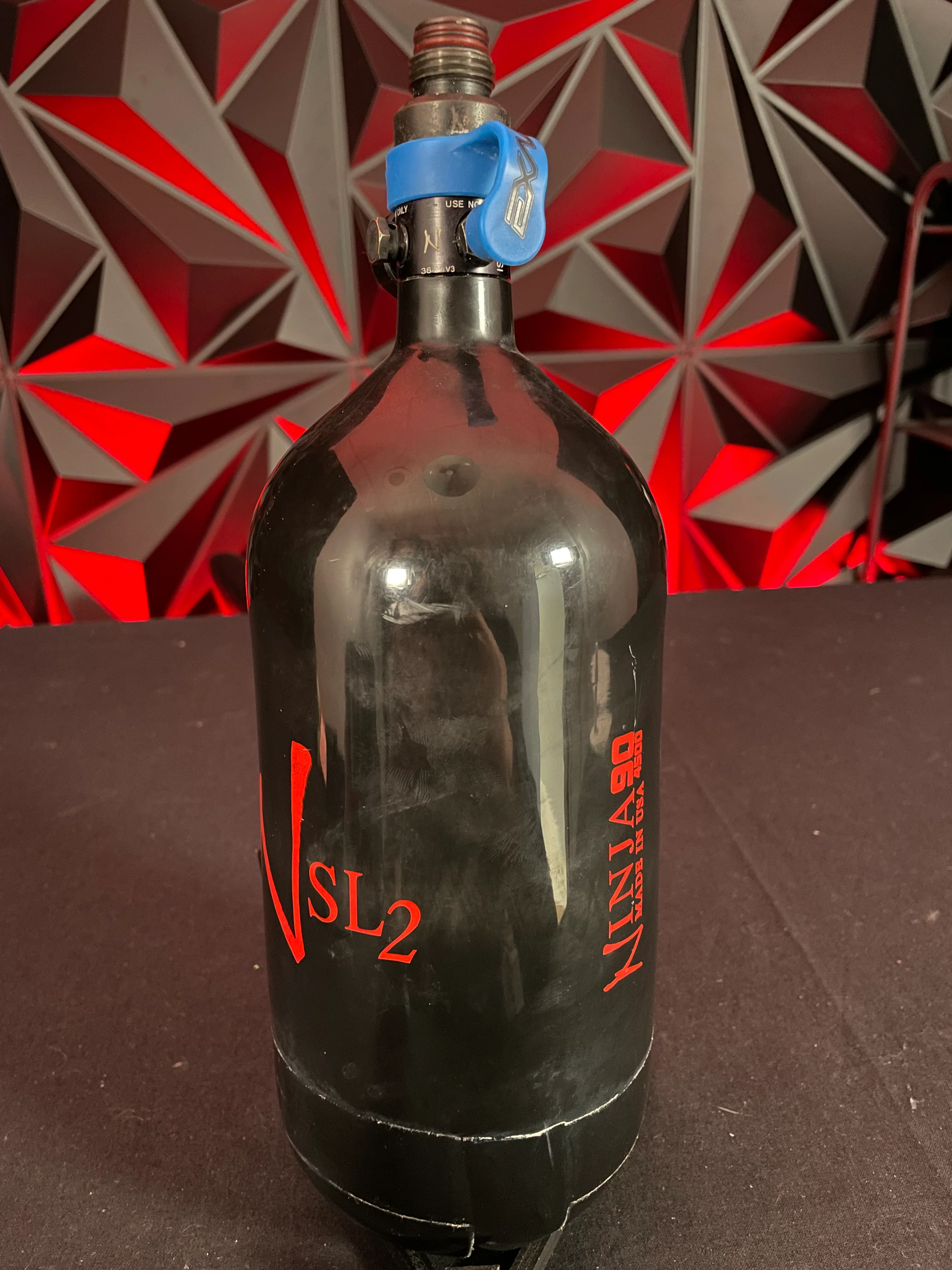 Used Ninja SL2 90/4500 Paintball Tank - Black/Red w/ProV2 Reg and Exalt Fill Nipple Cover