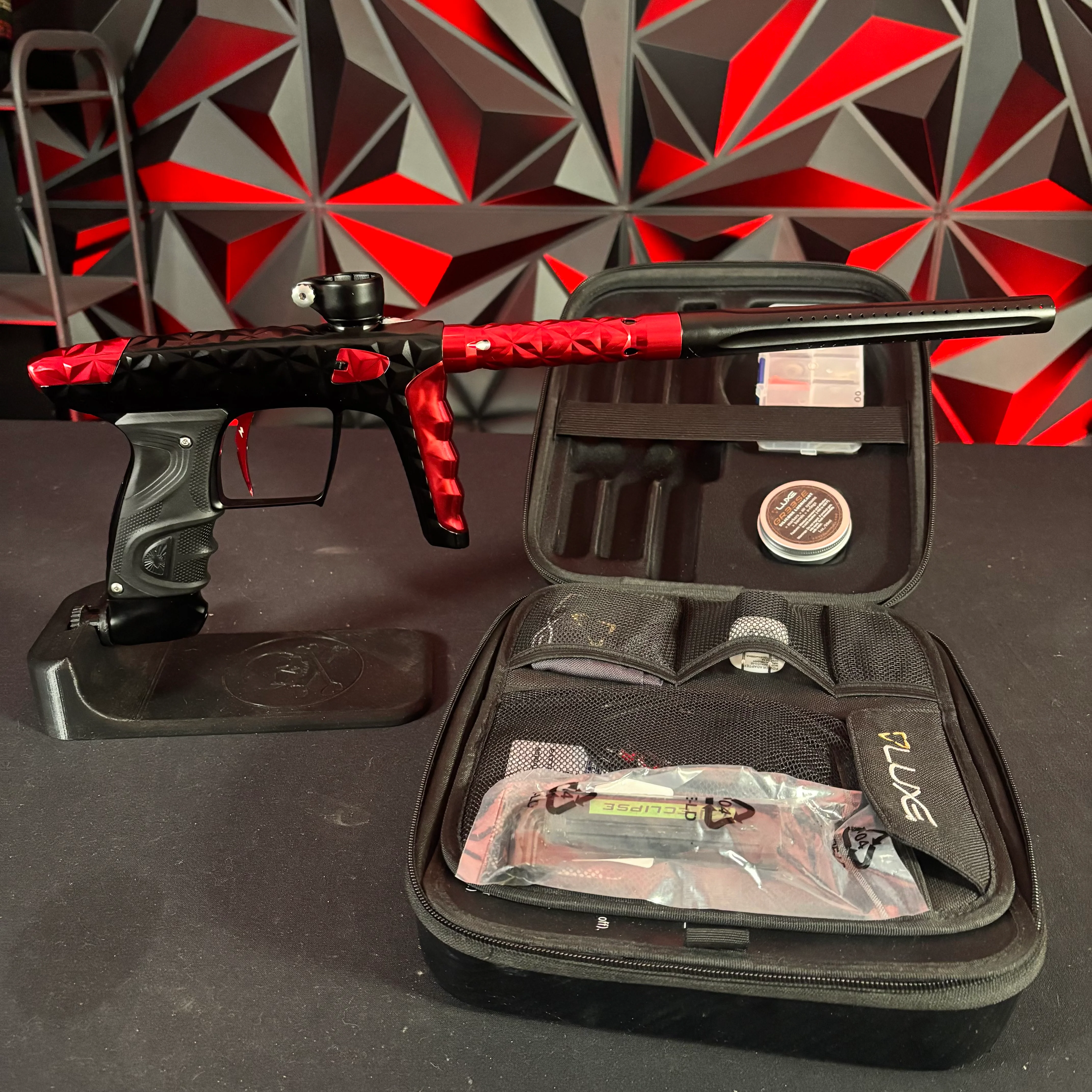 Used DLX LUXE "Adrenaline" TM40 Paintball Gun - Black/ Red