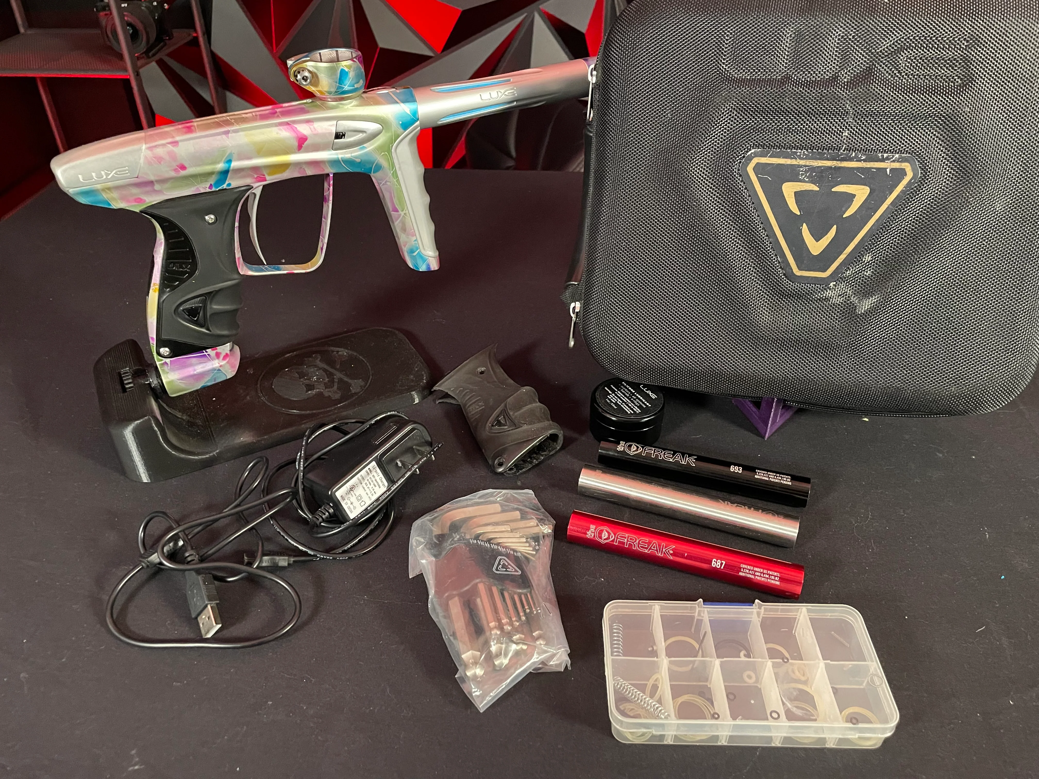 Used DLX Luxe ICE Paintball Gun - Multi-Color Splash w/ 4 Freak Inserts - Image 7