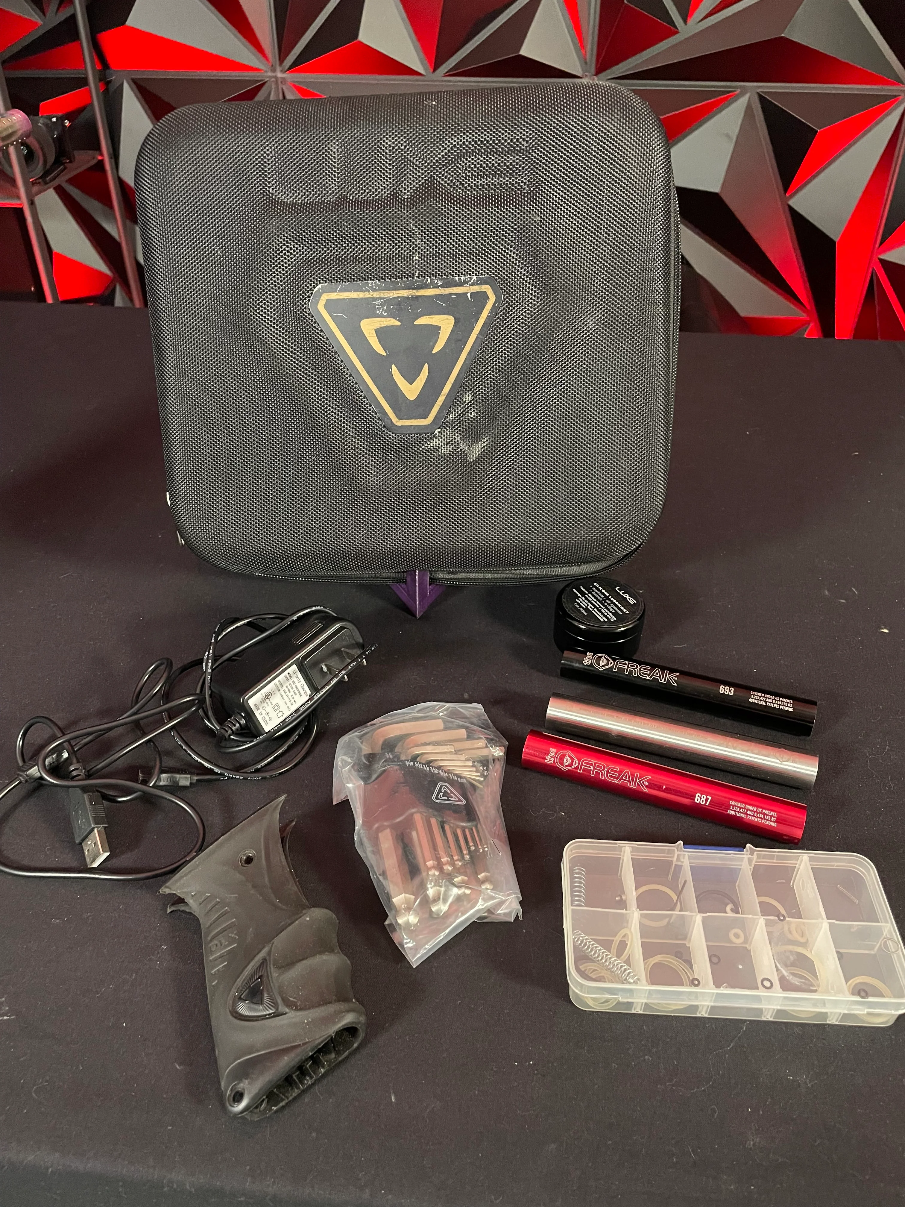 Used DLX Luxe ICE Paintball Gun - Multi-Color Splash w/ 4 Freak Inserts - Image 8