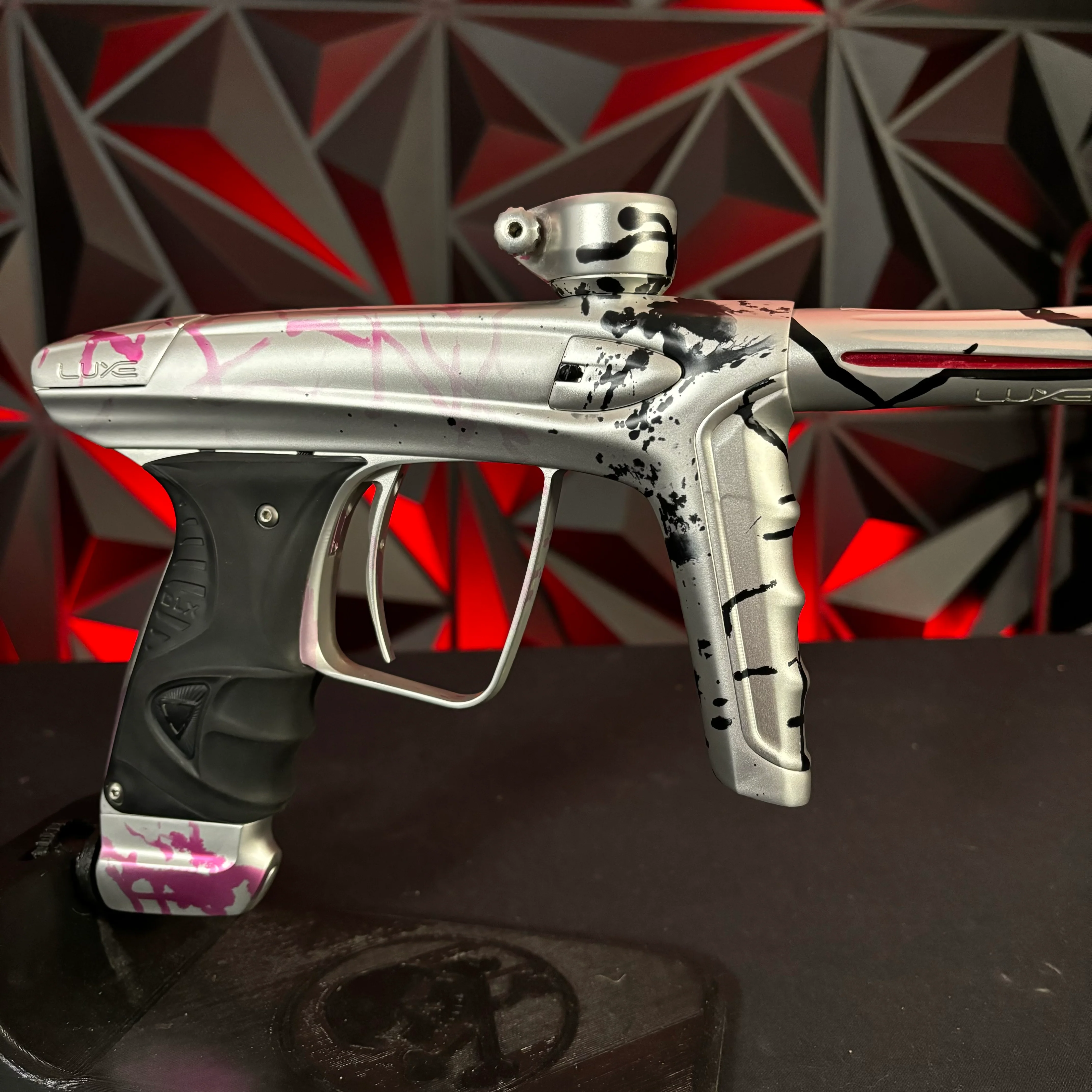 Used DLX Luxe ICE Paintball Gun - Silver/Pink and Black Splash #1 of 15 w/Encore Bolt, Adrenaline ASA, 3 Triggers, and Extra Grip Plates - Image 2