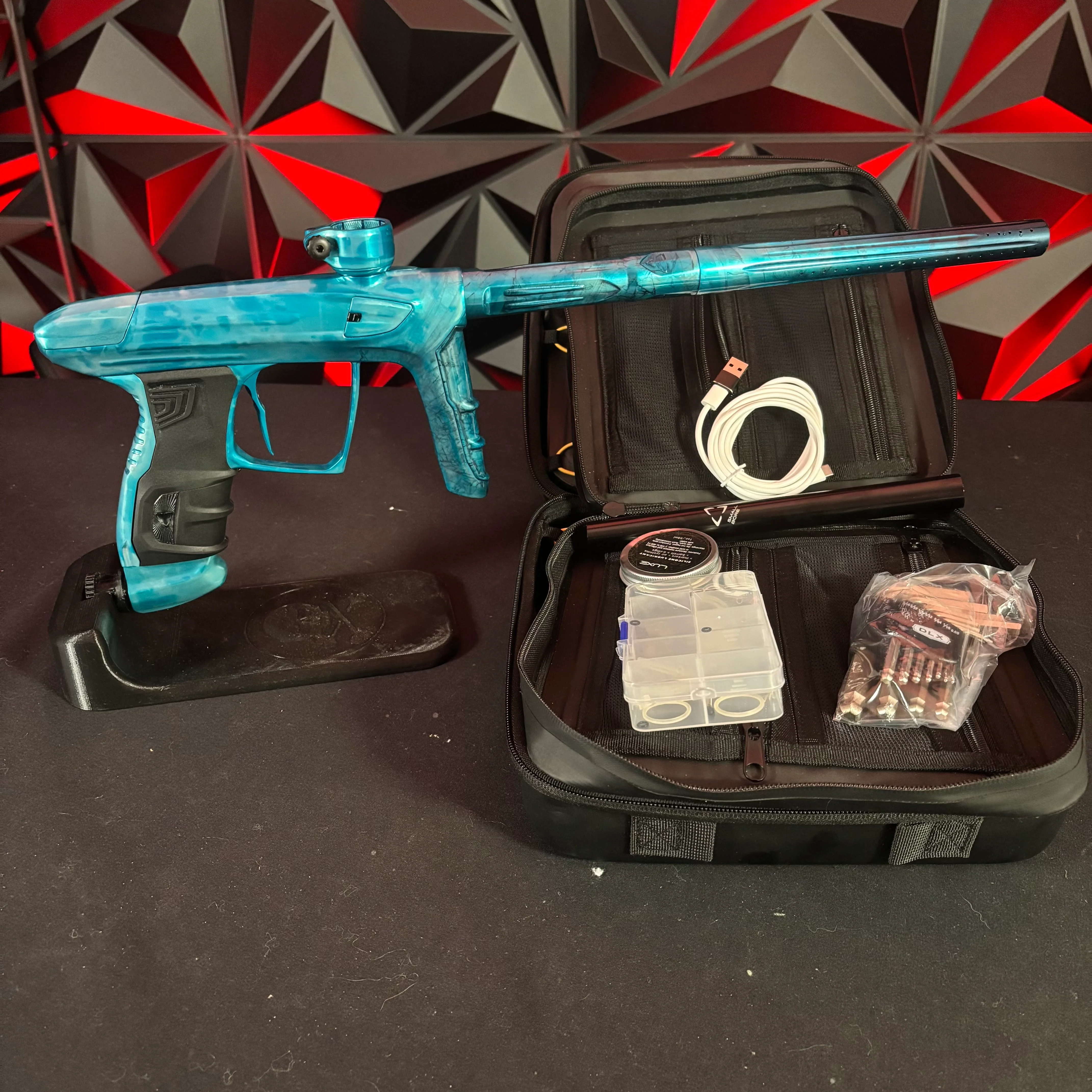 Used DLX Luxe IDOL Paintball Gun - Polished Teal Splash