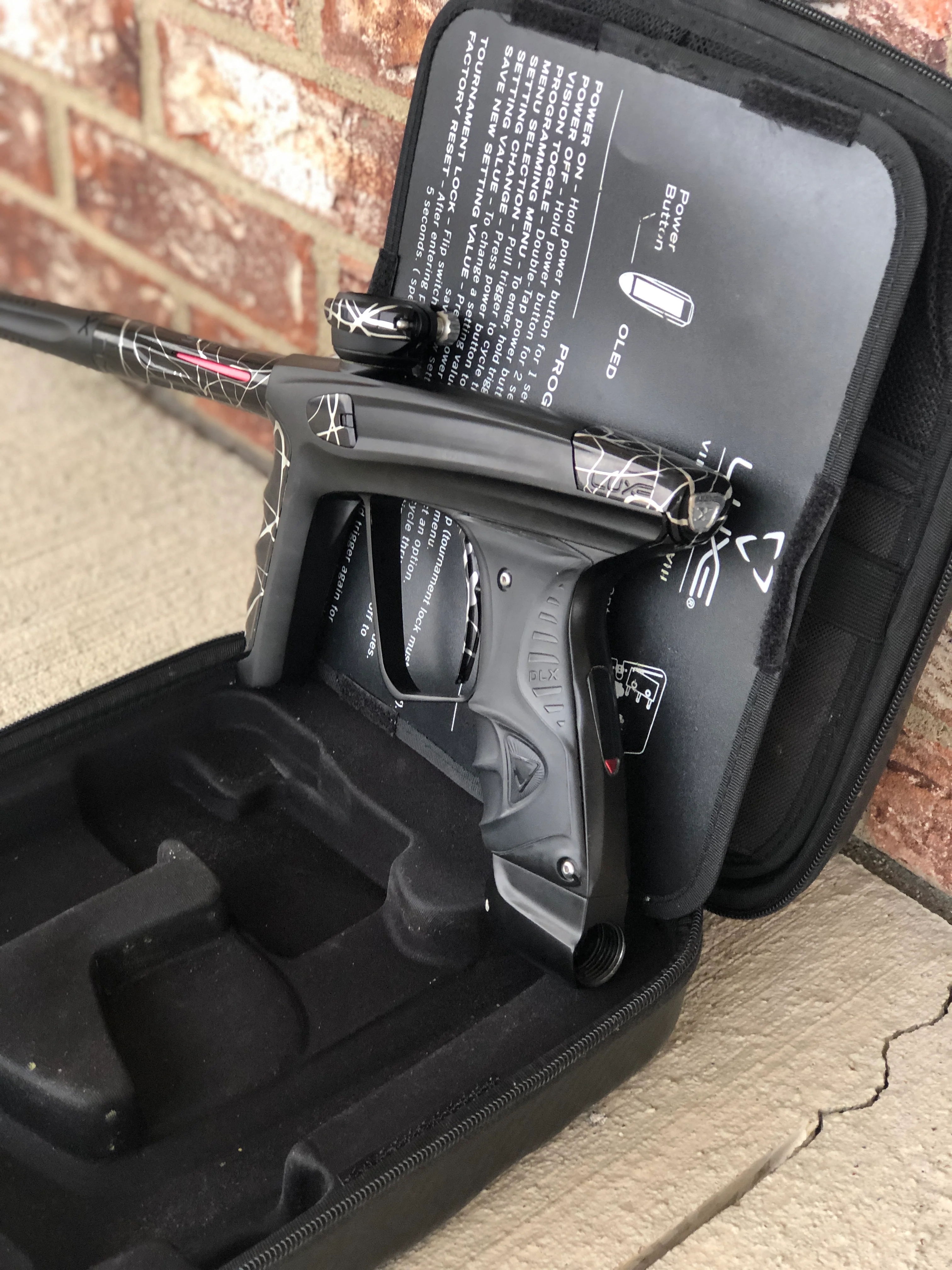 Used DLX Luxe X Paintball Gun - Dust Black w/ Black & Silver Splash Accents - Image 3