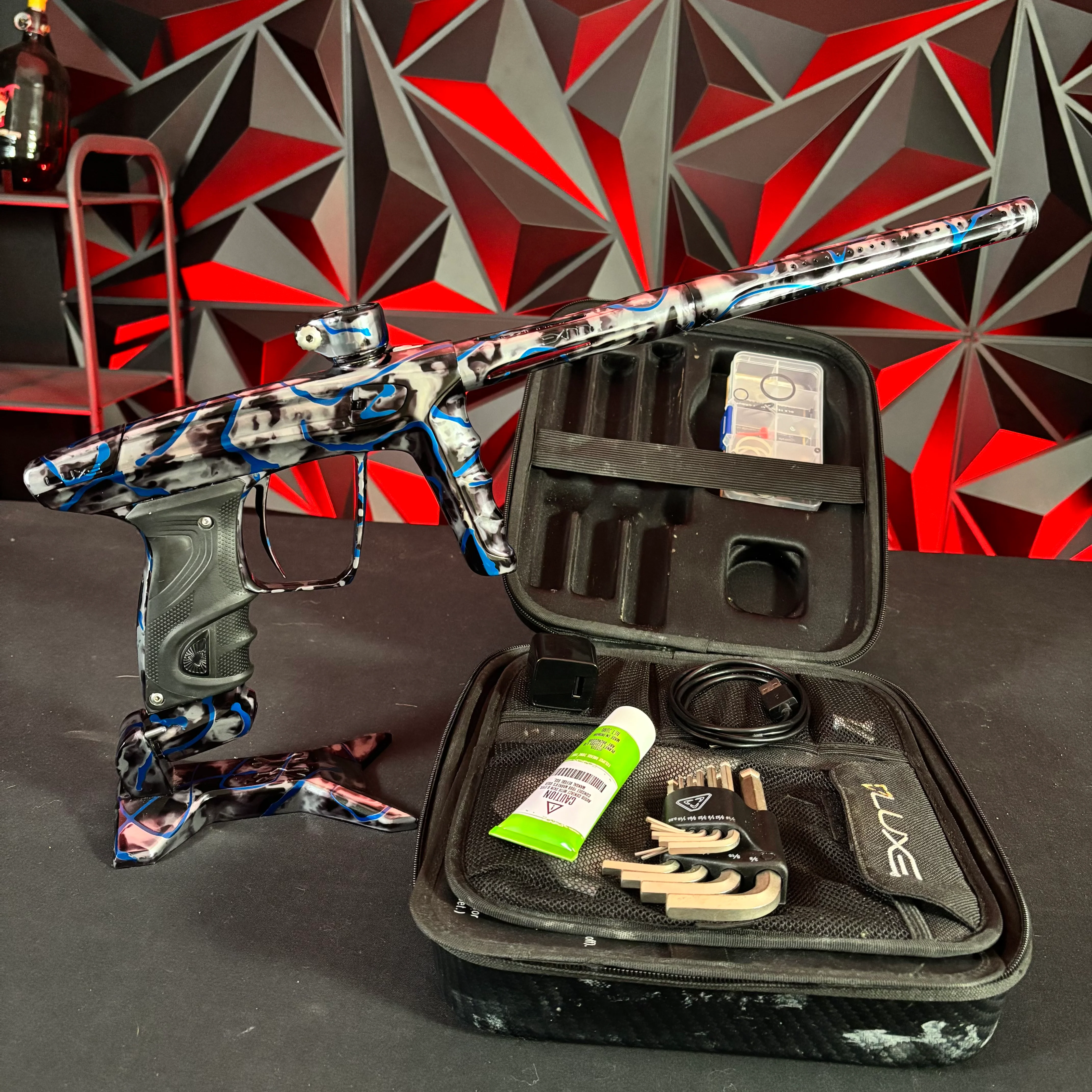 Used DLX Luxe X Paintball Gun - *Custom Anno* Gloss Grey/Black Acid Wash w/ Blue Splash w/ Matching HK Army Gun Stand