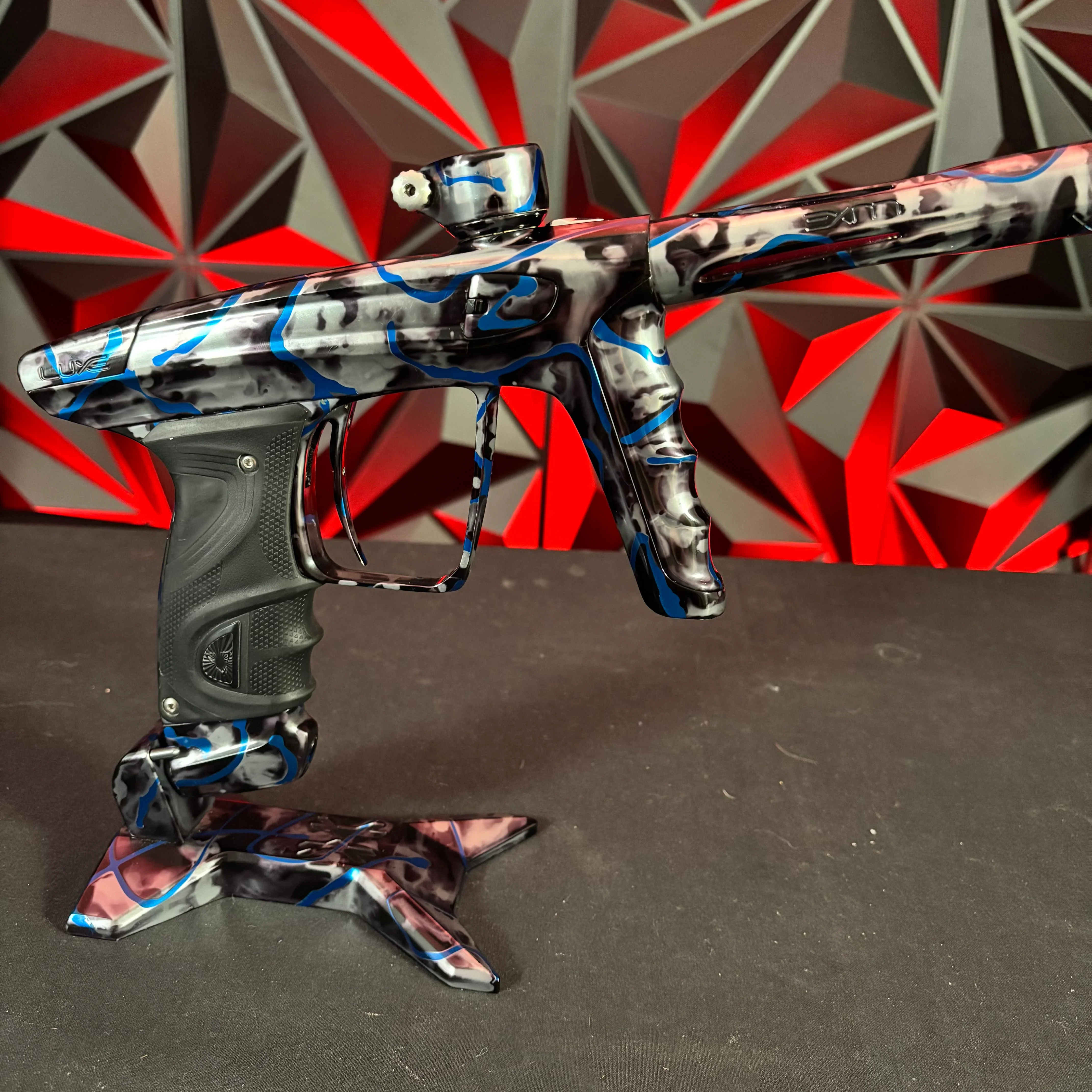 Used DLX Luxe X Paintball Gun - *Custom Anno* Gloss Grey/Black Acid Wash w/ Blue Splash w/ Matching HK Army Gun Stand - Image 2