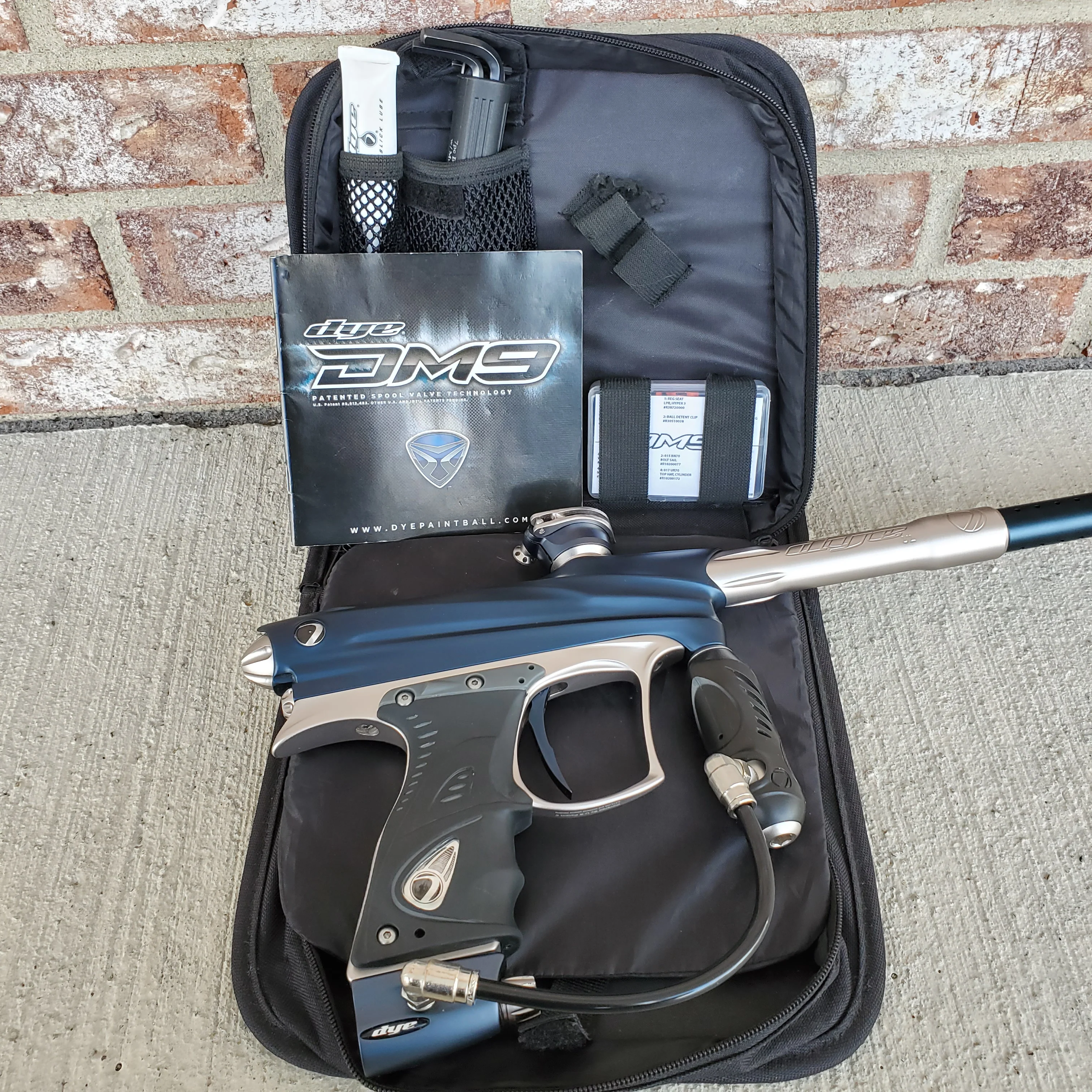 Used Dye DM9 Paintball Marker - Blue / Silver - Image 5