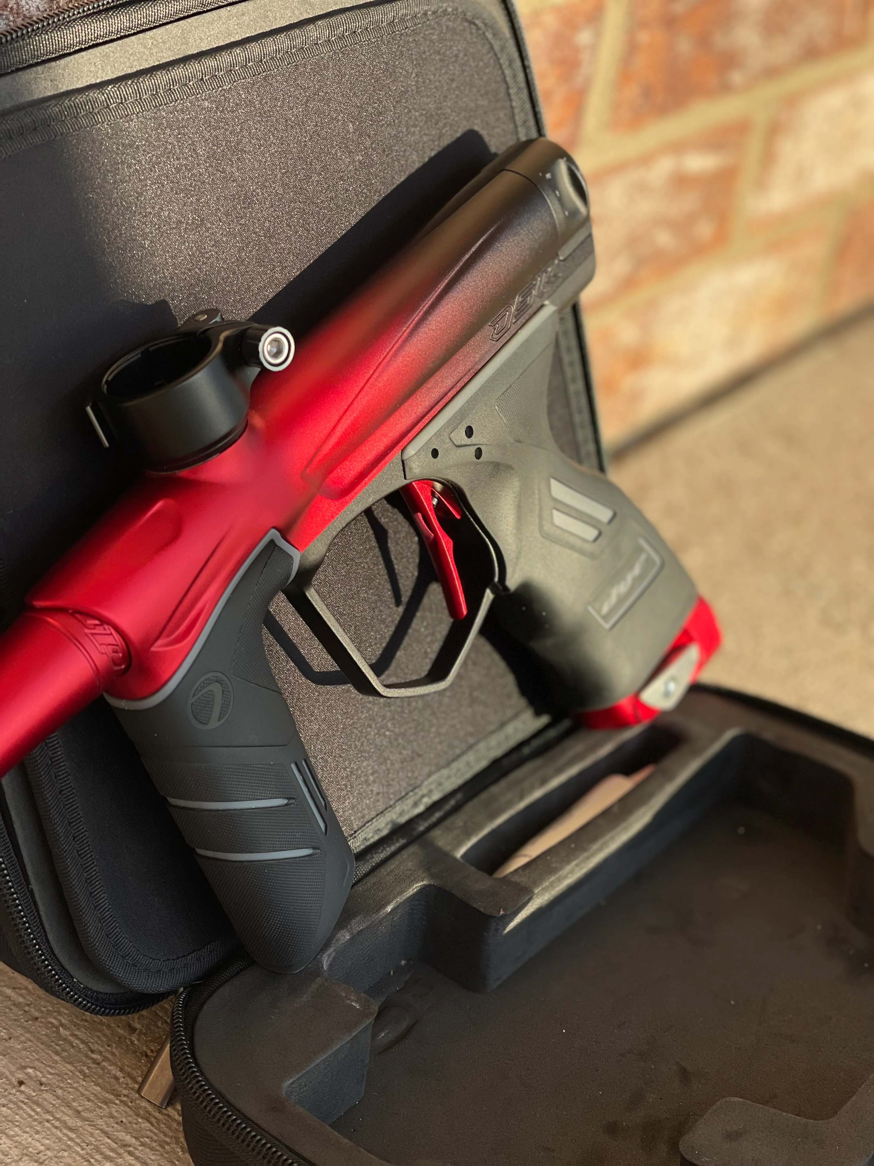 Used Dye DSR Paintball Gun - Black Cherry w/ Flex Face Bolt, Flex Flow Can, 4th Gen Eye Pipe, and Lockdown 2 Feedneck - Image 3