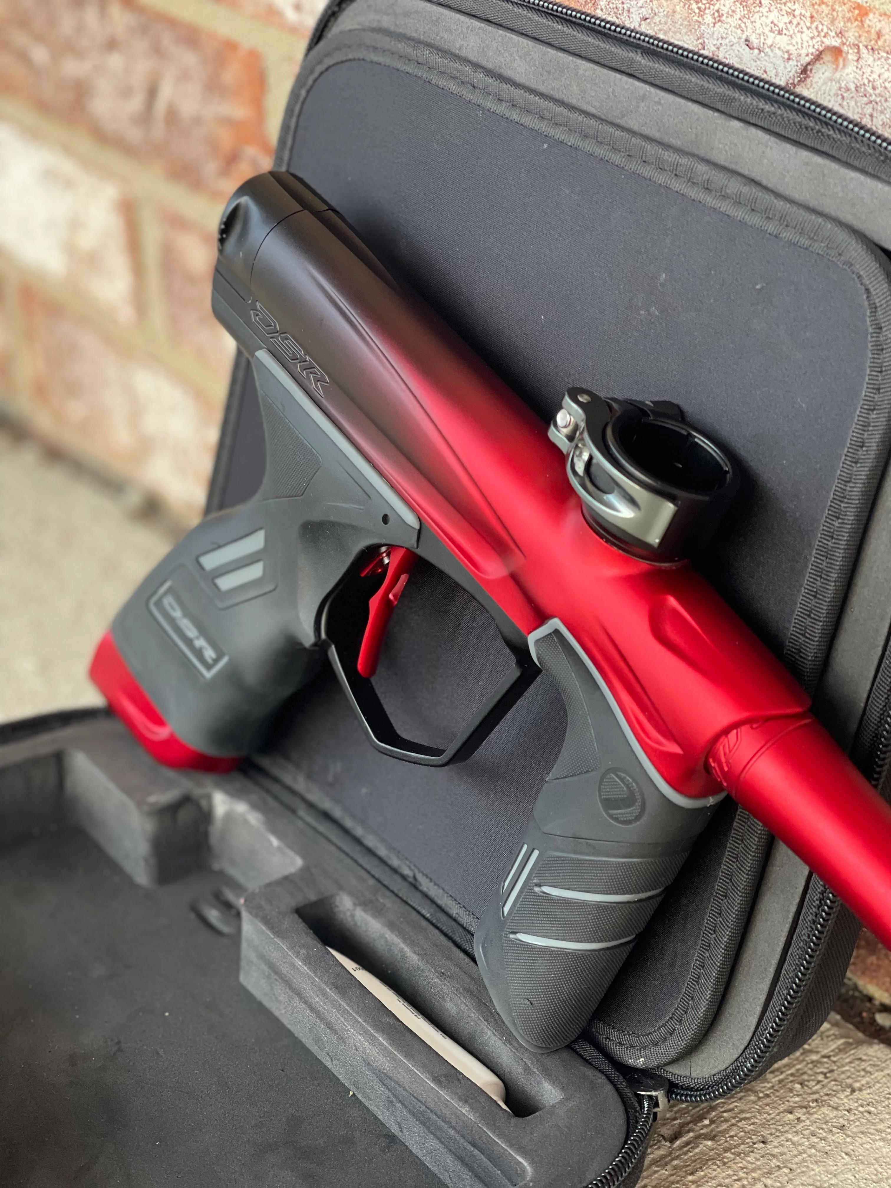 Used Dye DSR Paintball Gun - Black Cherry w/ Flex Face Bolt, Flex Flow Can, 4th Gen Eye Pipe, and Lockdown 2 Feedneck - Image 4