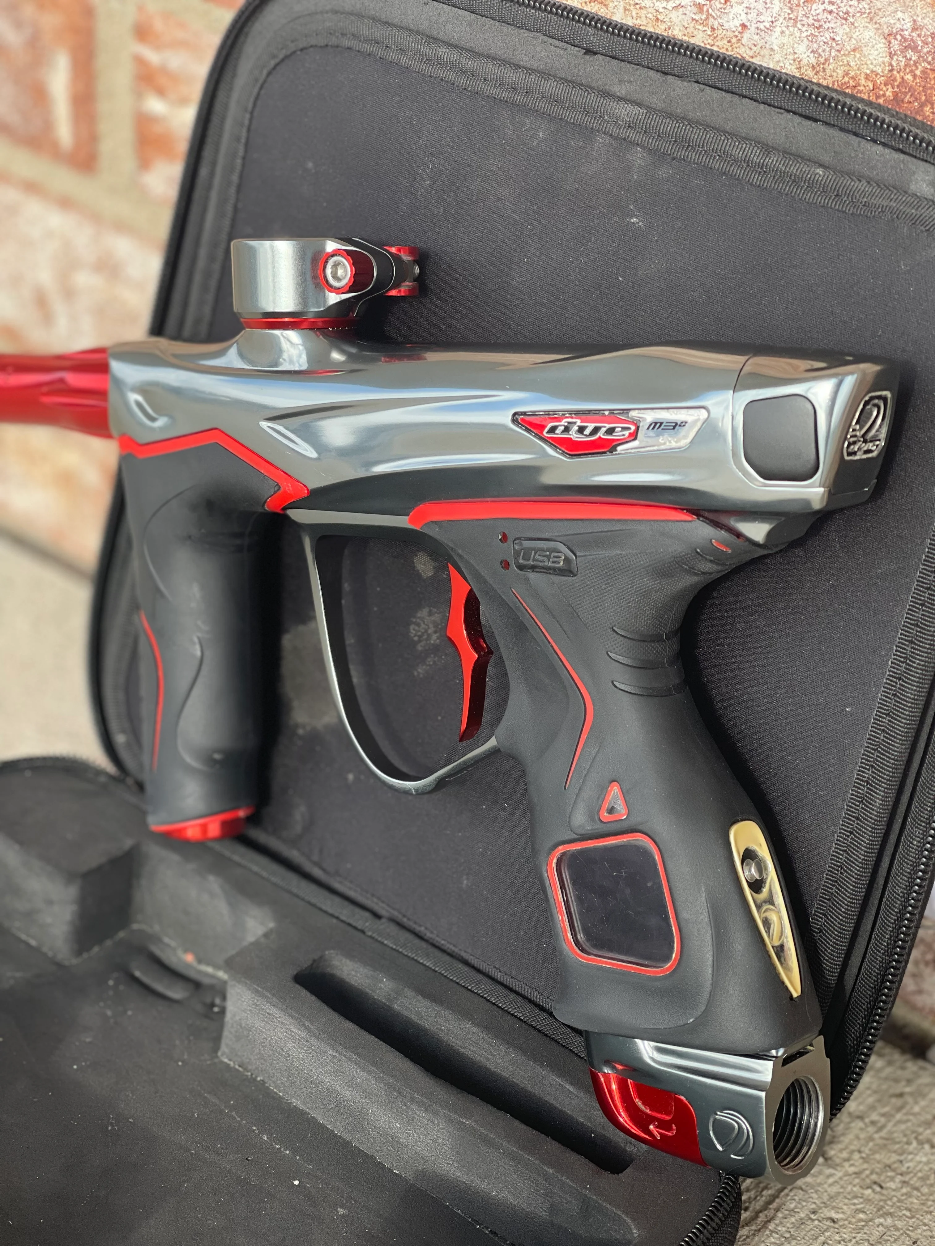 Used Dye M3+ Paintball Gun - Grey/Red - Image 2