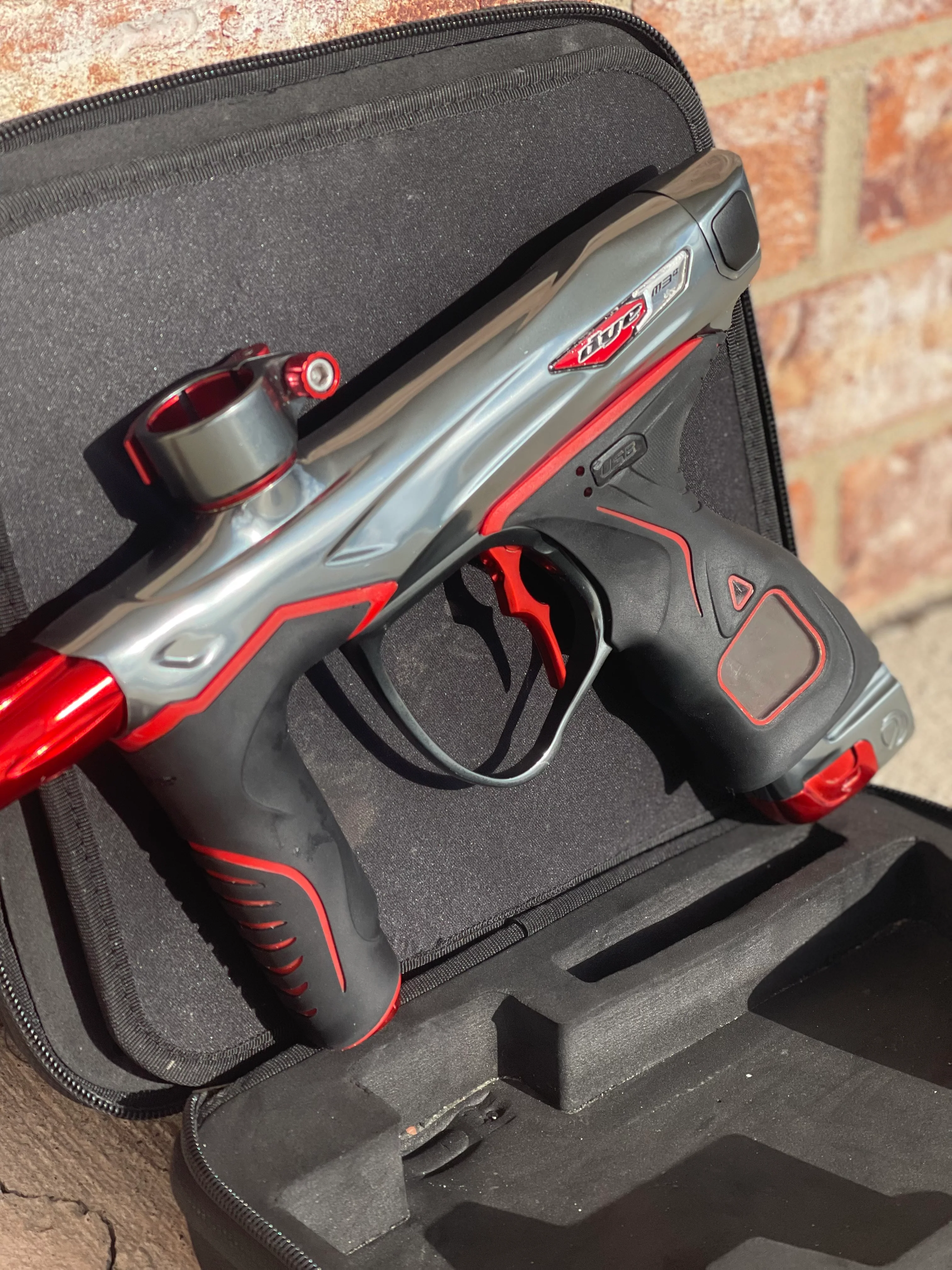 Used Dye M3+ Paintball Gun - Grey/Red - Image 4