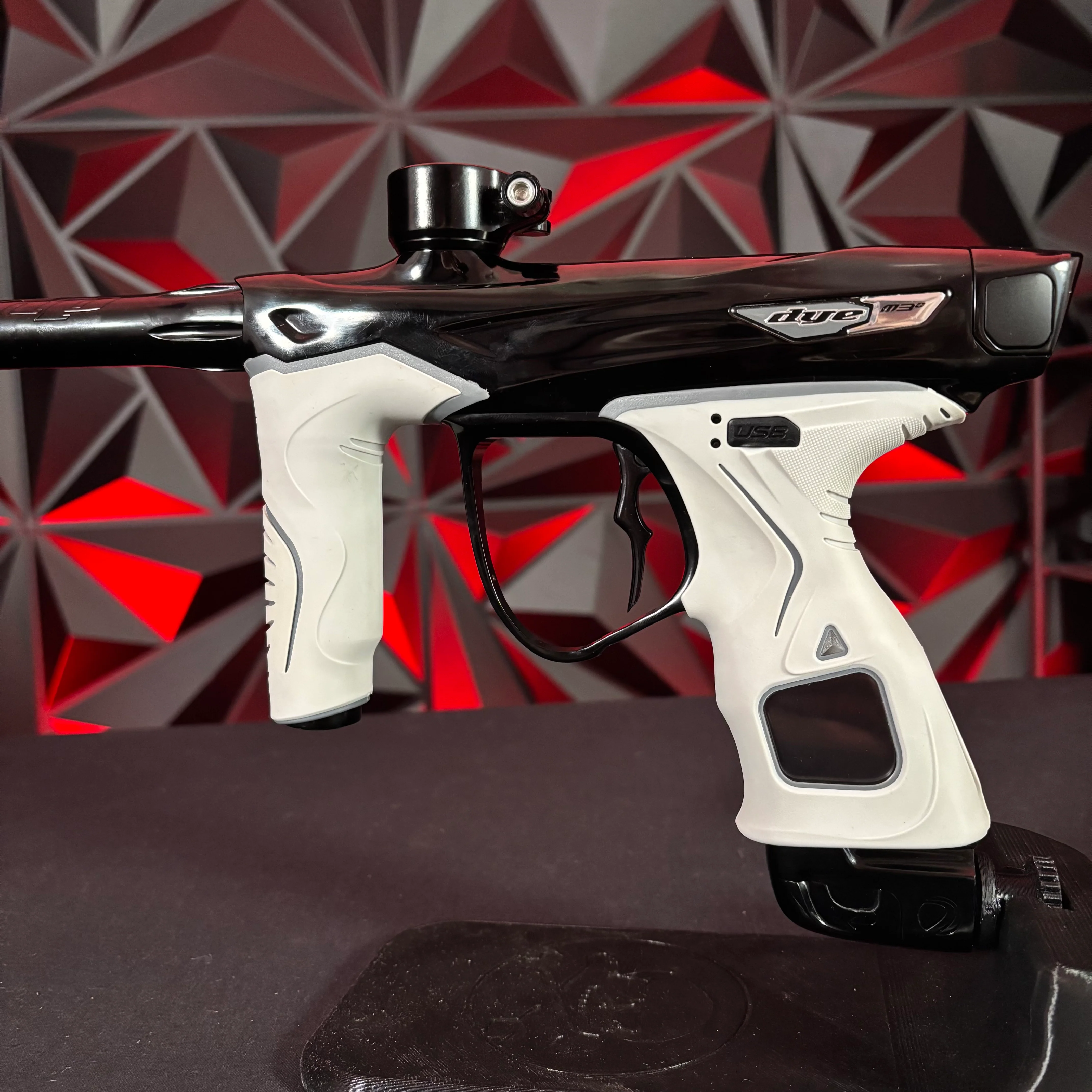 Used Dye M3+ Paintball Gun - Lights Out w/MOSAir Wireless Charging Pad & White/Grey Grip Kit - Image 3