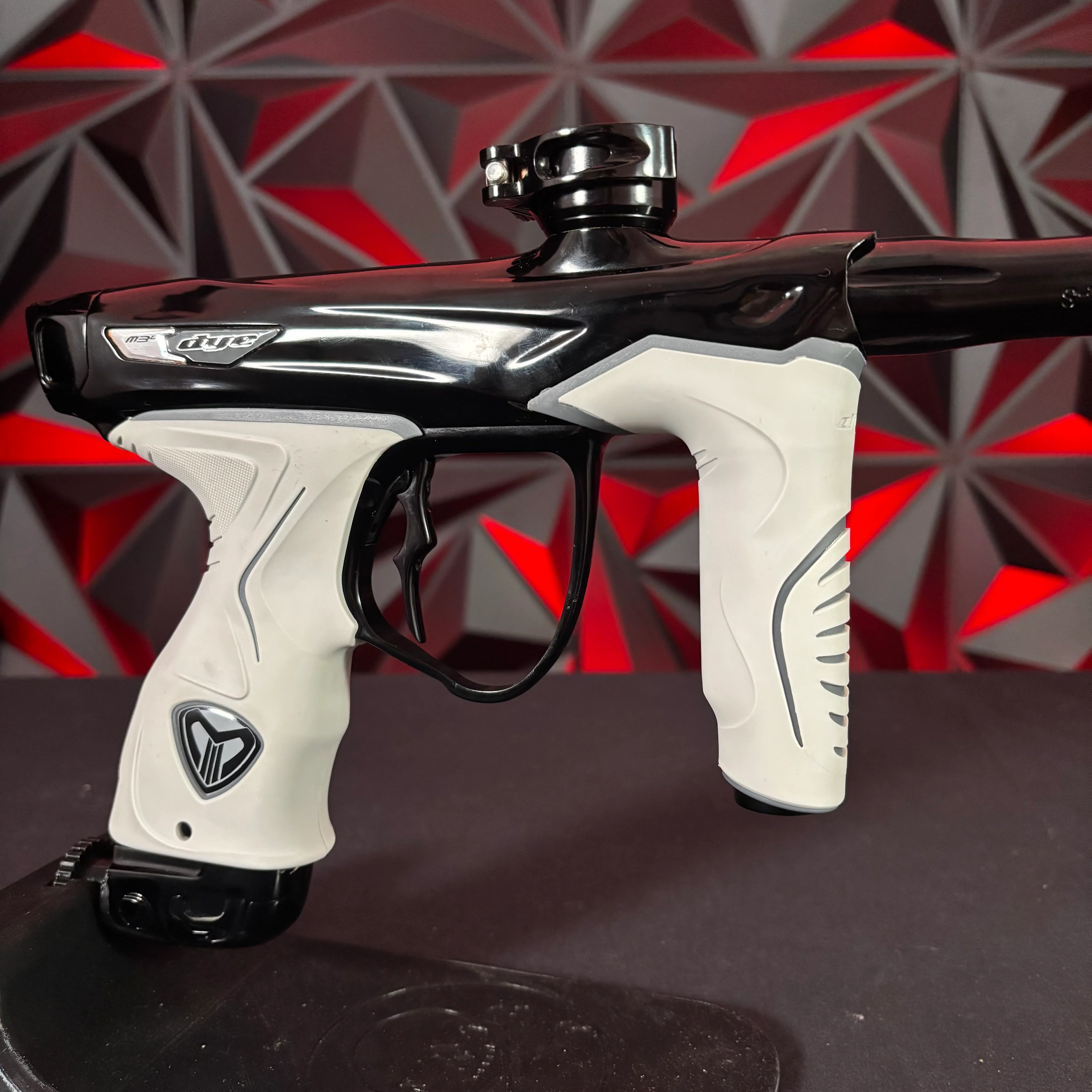 Used Dye M3+ Paintball Gun - Lights Out w/MOSAir Wireless Charging Pad & White/Grey Grip Kit - Image 4