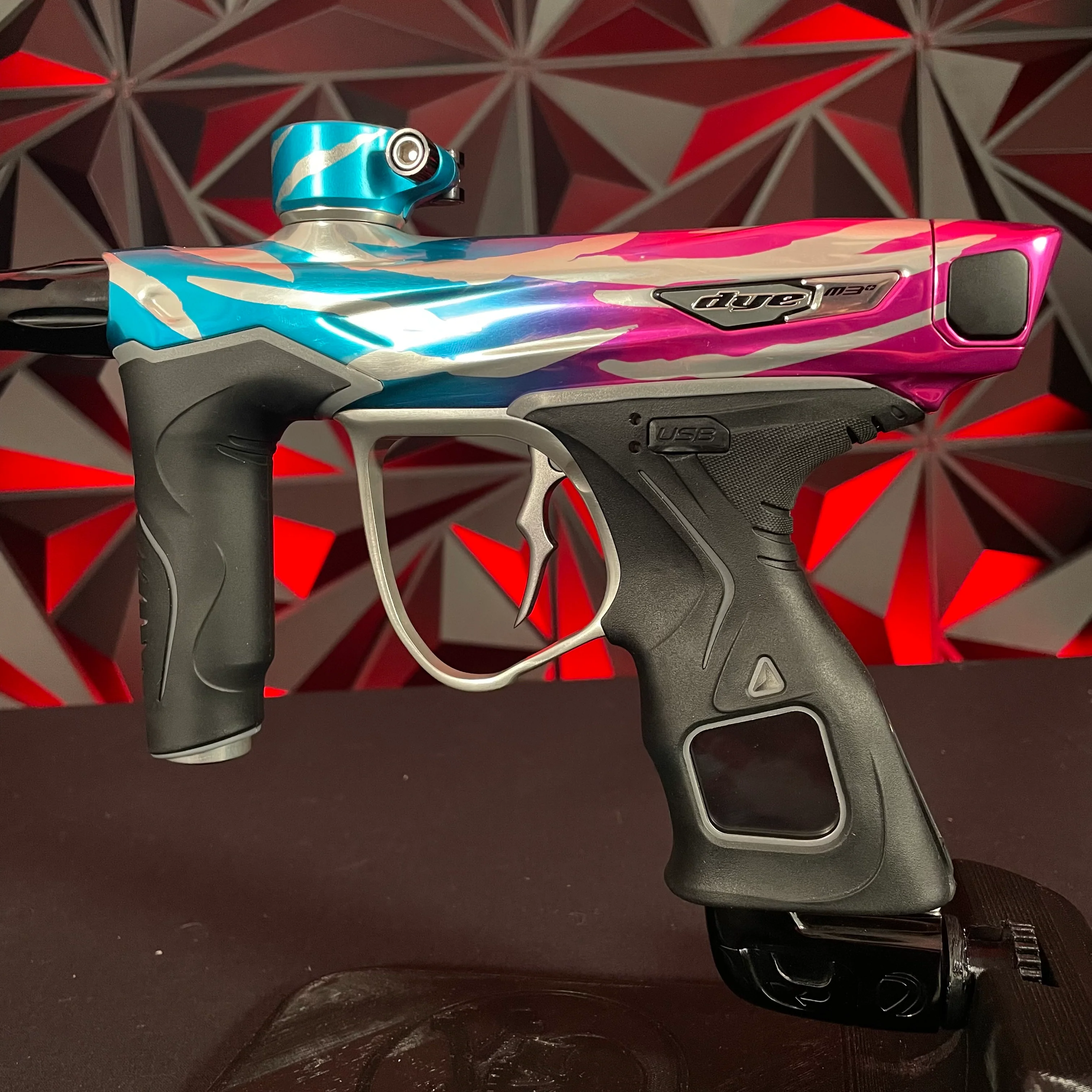 Used Dye M3+ Paintball Gun - Tiger Royalty (Pink & Cyan) w/ MOSAir Charging Pad - Image 3