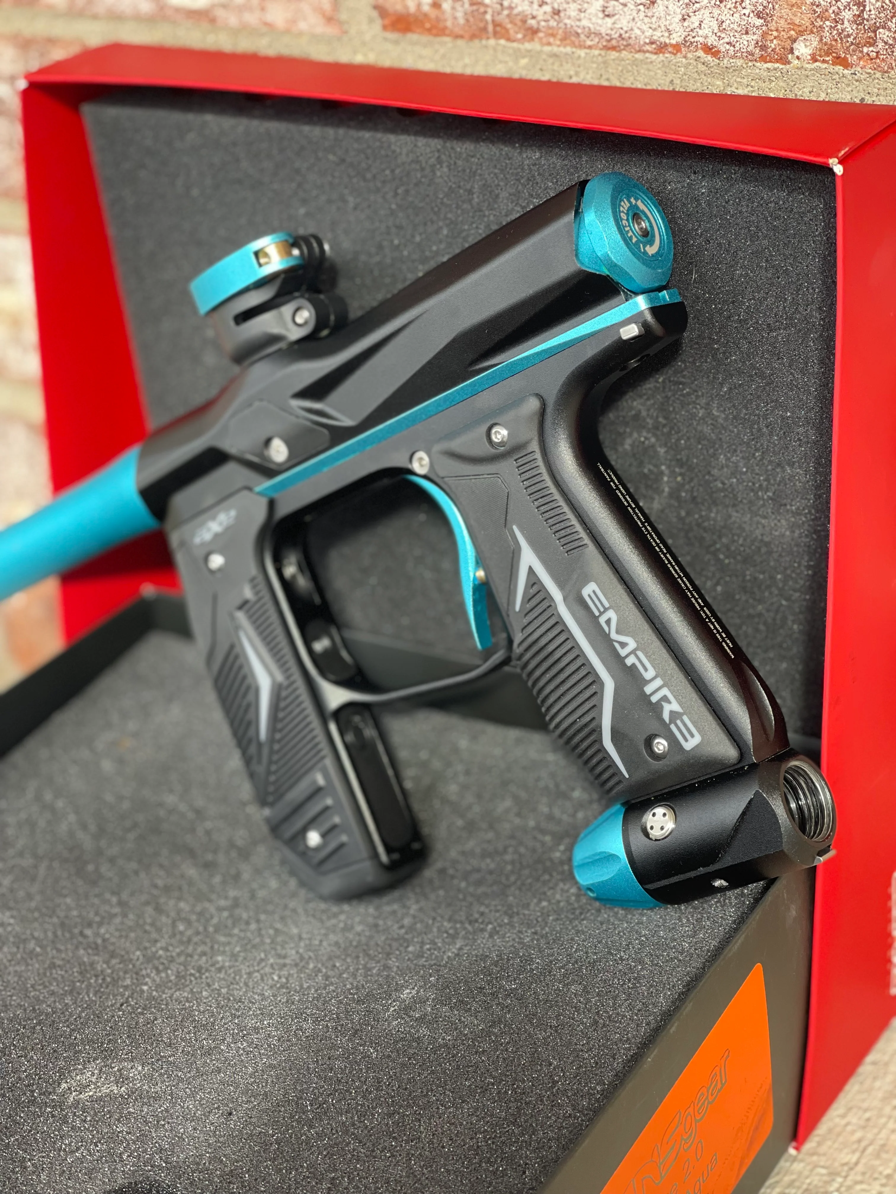 Used Empire Axe 2.0 Paintball Gun - Black w/Teal Accents - Image 2
