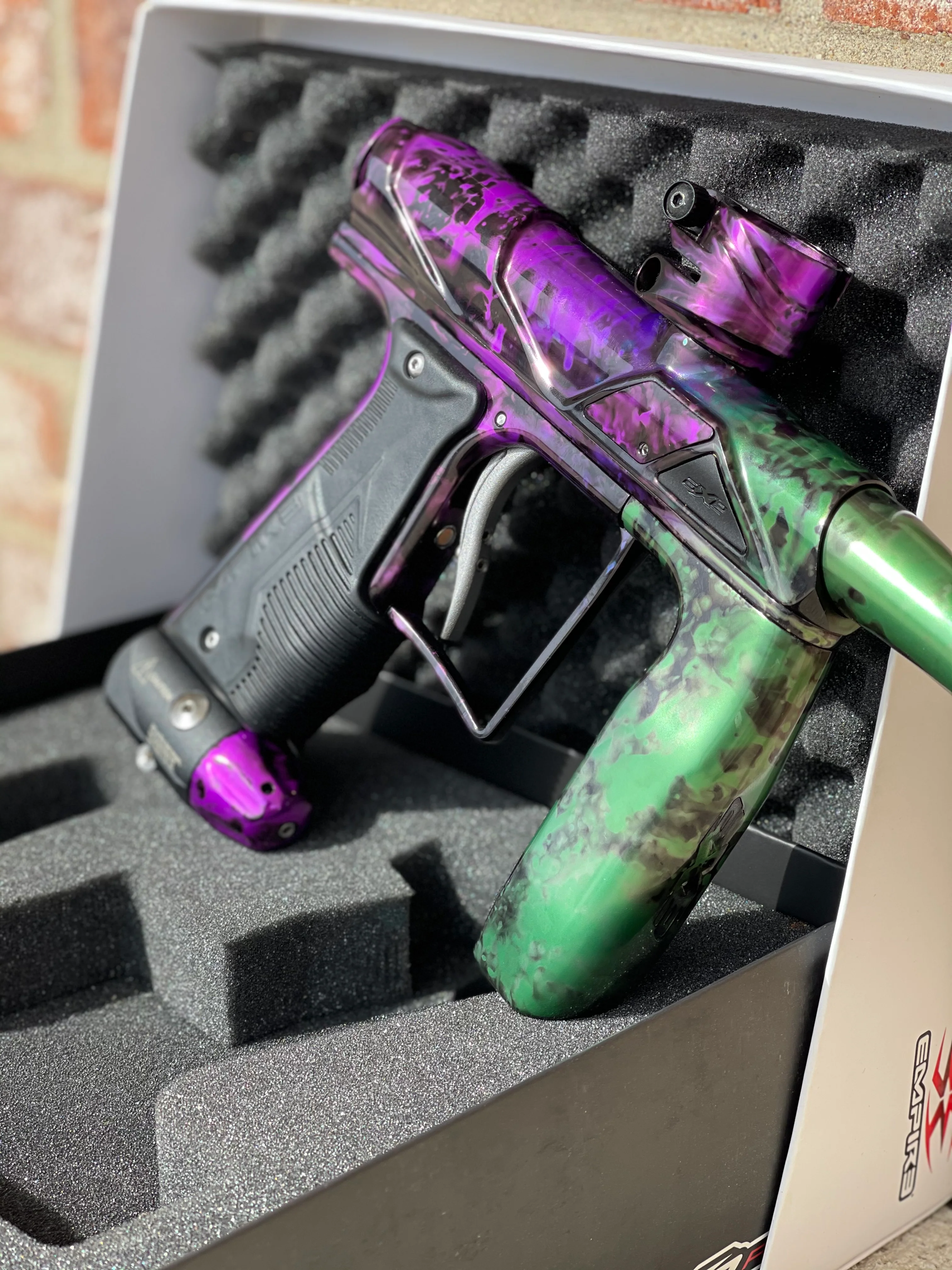 Used Empire Axe Pro Paintball Gun - Acid Wash Pruple / Green - Image 2