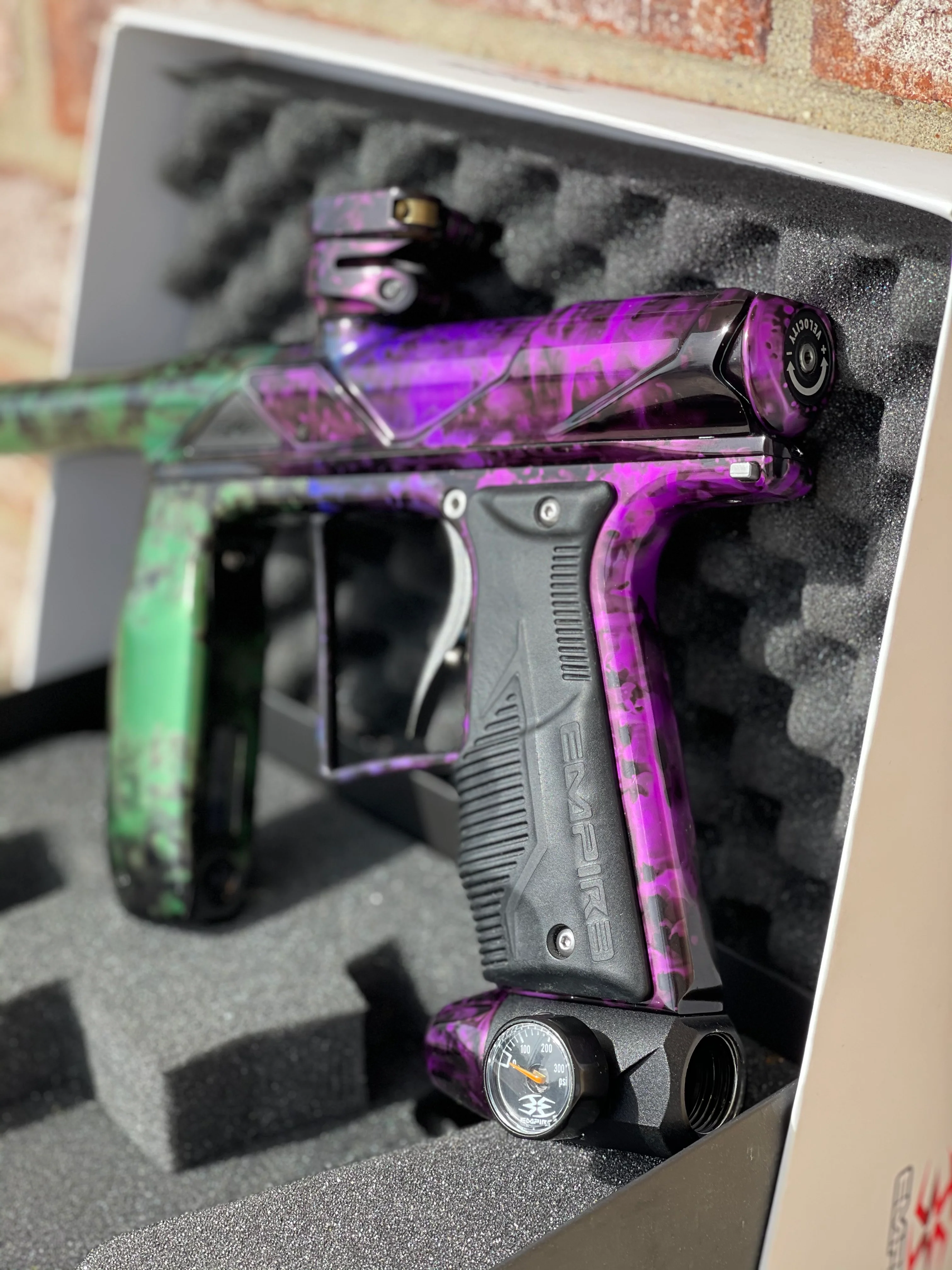 Used Empire Axe Pro Paintball Gun - Acid Wash Pruple / Green - Image 3