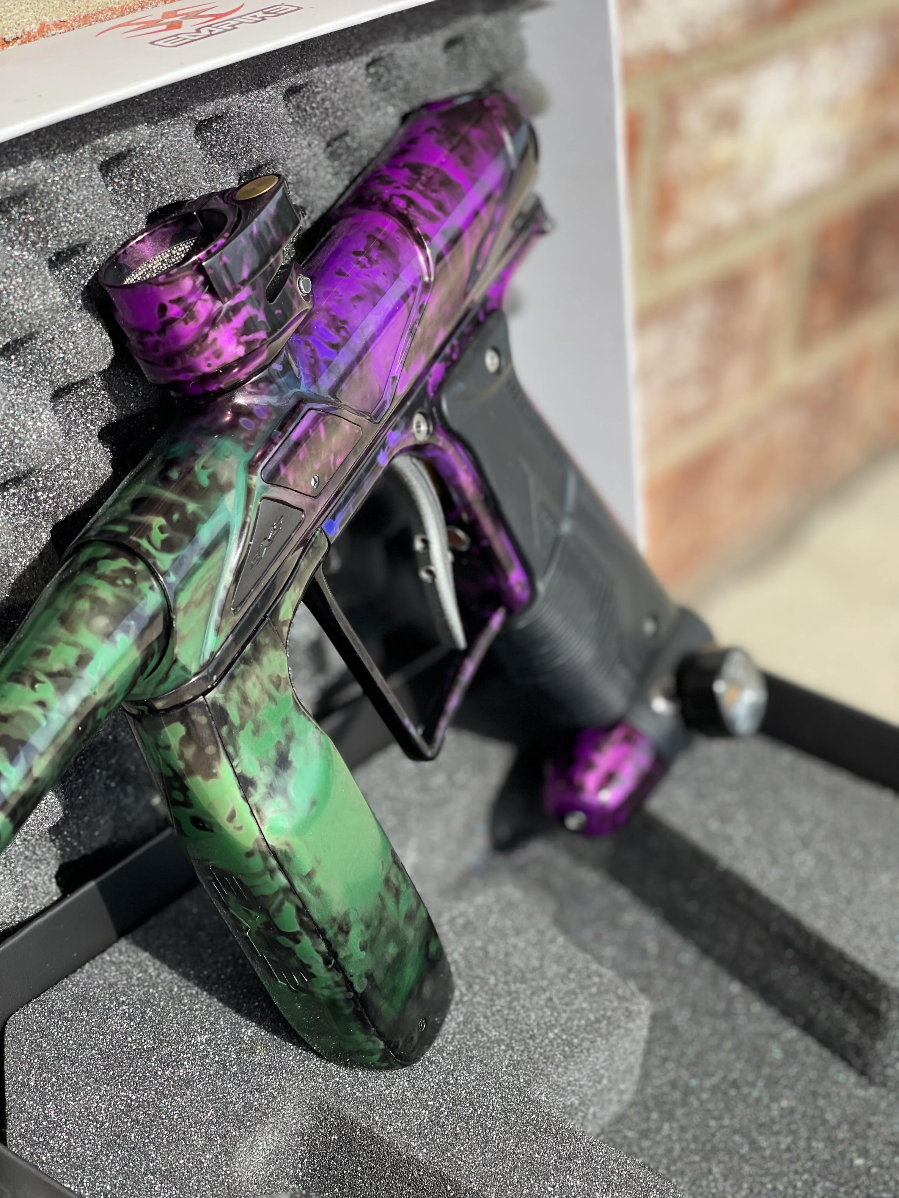 Used Empire Axe Pro Paintball Gun - Acid Wash Pruple / Green - Image 4