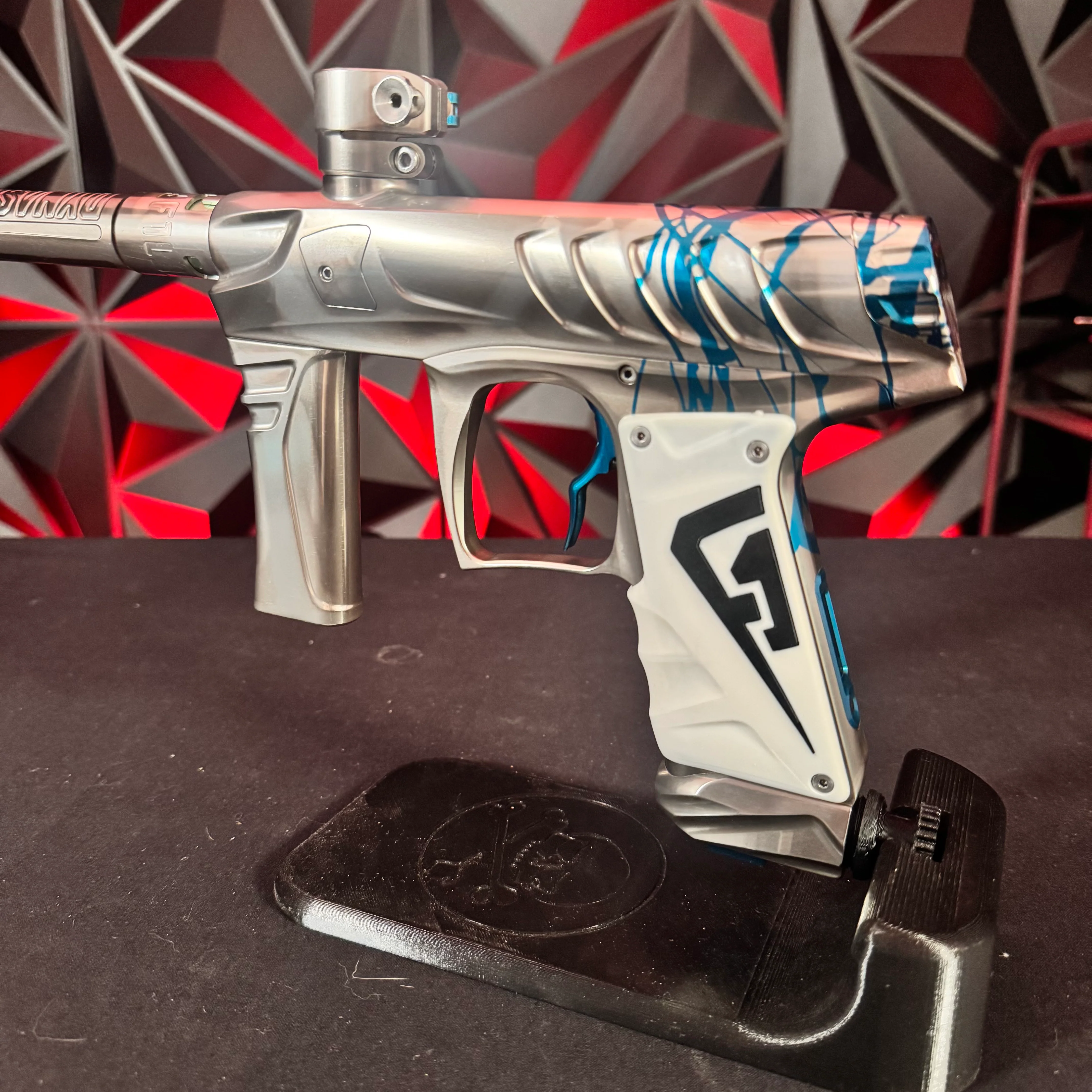 Used Field One Force Paintball Gun - Polished Silver w/Blue Splash & 6 Acculock Inserts - Image 3