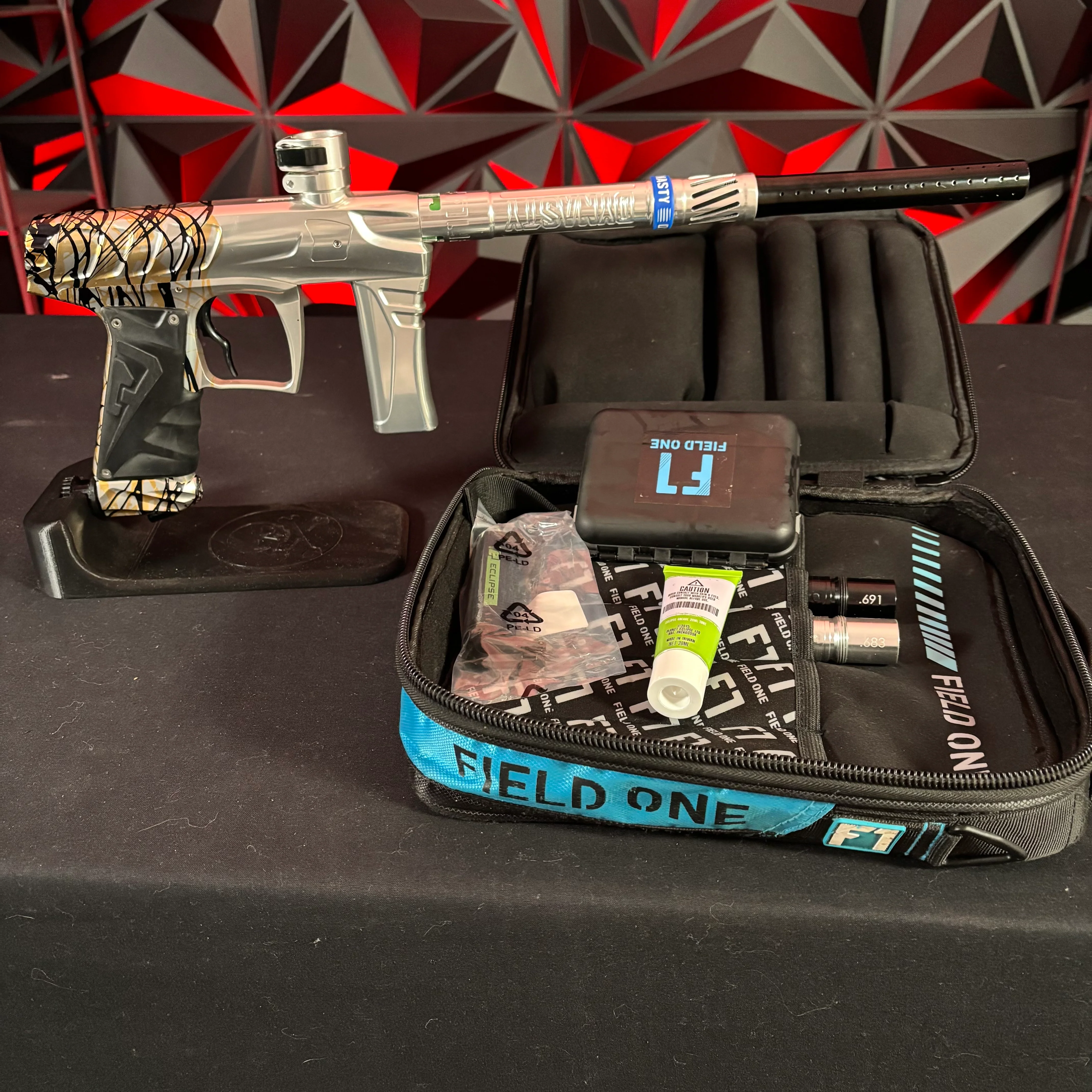 Used Field One Force Paintball Gun - Polished Gold/Black/Silver Splash & 3 Acculock Inserts