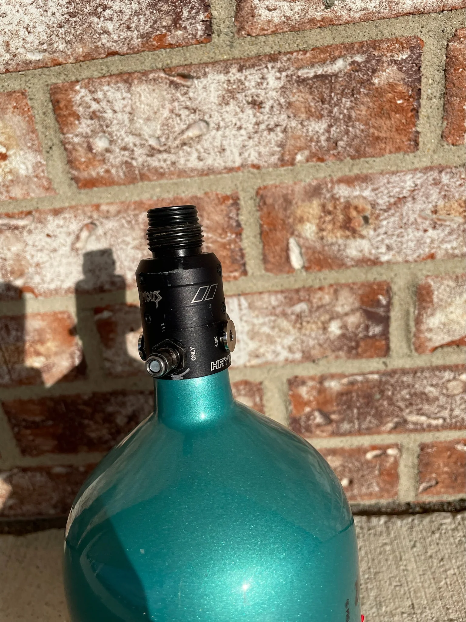 Used Infamous 80/4500 Skeleton Air Paintball Tank - Teal / Black w/ Infamous Powerhouse Regulator and Exalt Tank Cover - Image 3