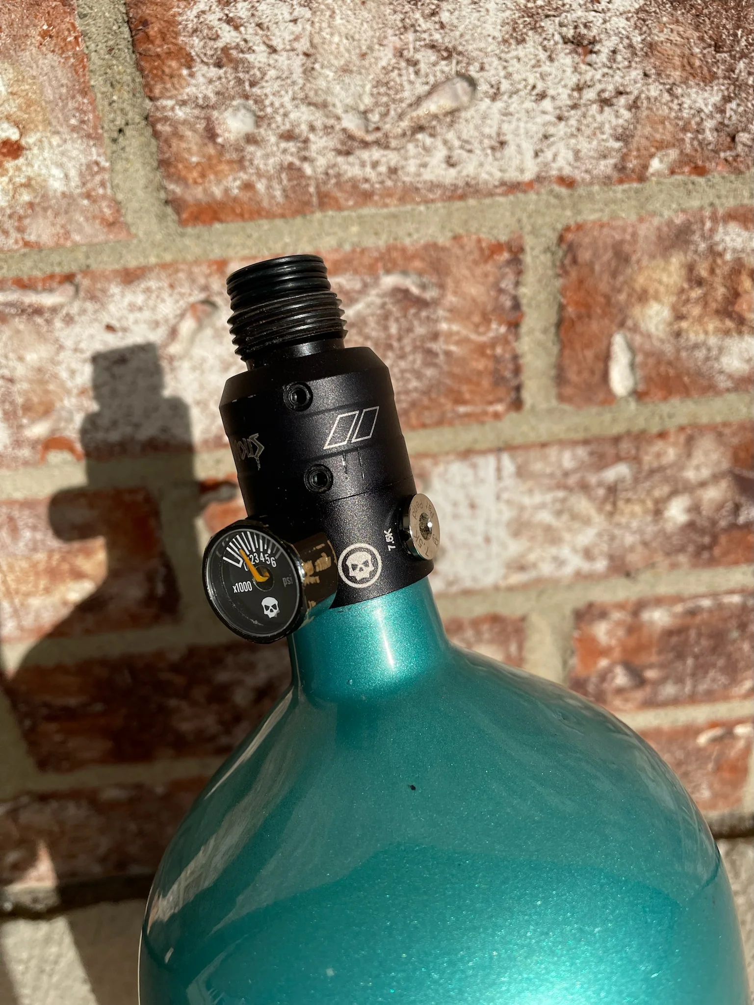 Used Infamous 80/4500 Skeleton Air Paintball Tank - Teal / Black w/ Infamous Powerhouse Regulator and Exalt Tank Cover - Image 4
