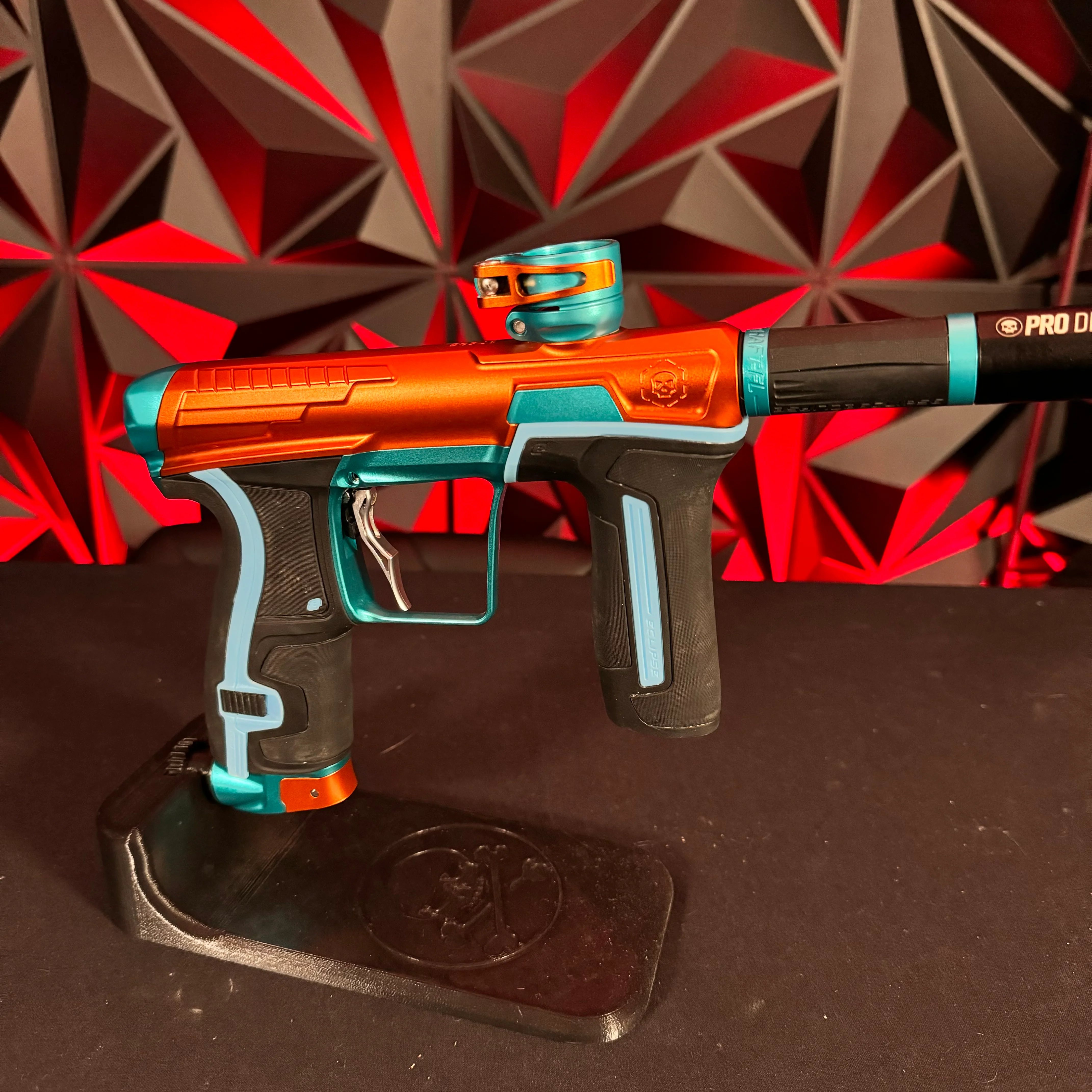 Used Infamous/Planet Eclipse CS2 Paintball Gun - Orange/Teal w/ 3 FL Backs & Infamous Deuce Trigger - Image 4