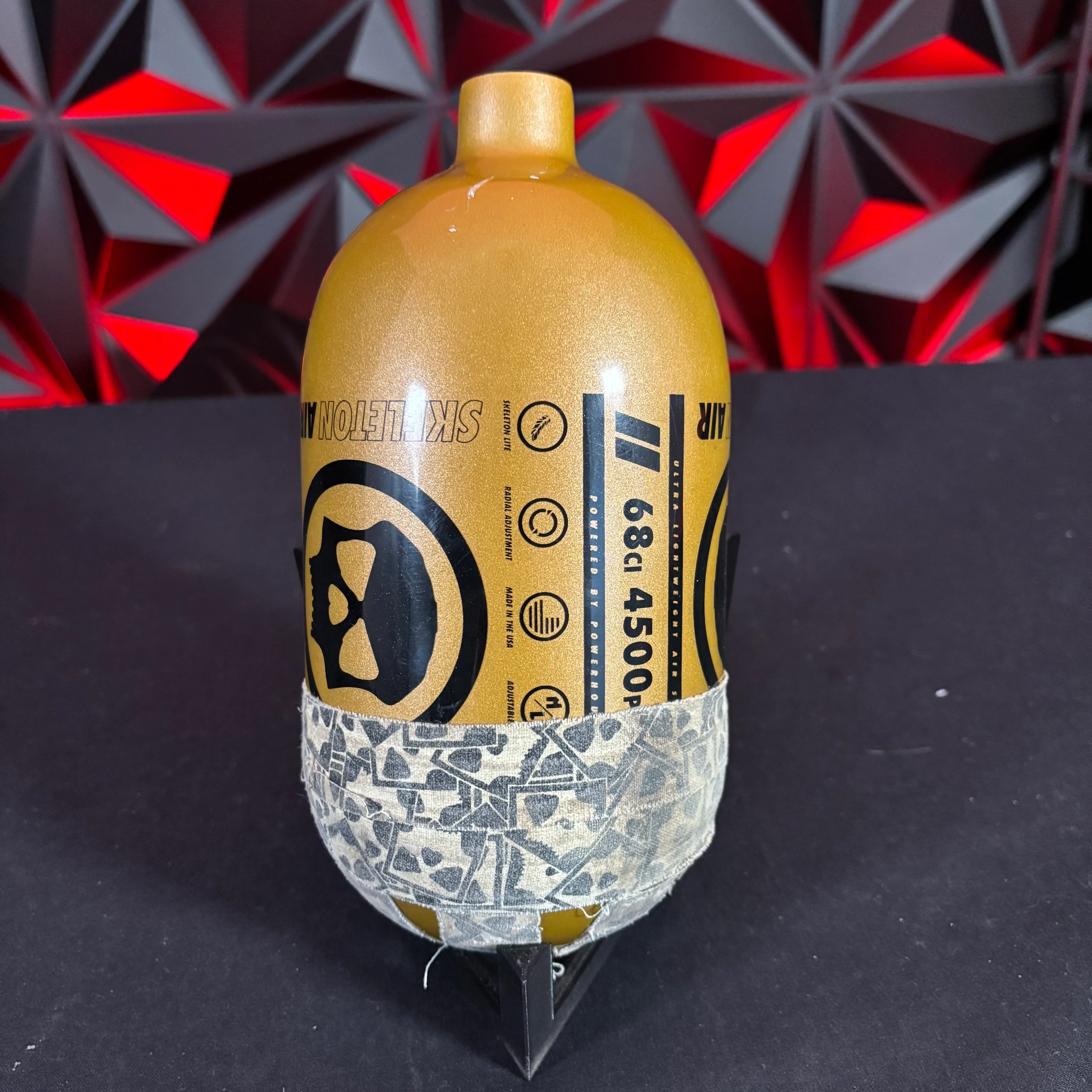 Used Infamous "Skeleton Air" Hyperlight 68/4500 Paintball Tank - Gold/Black