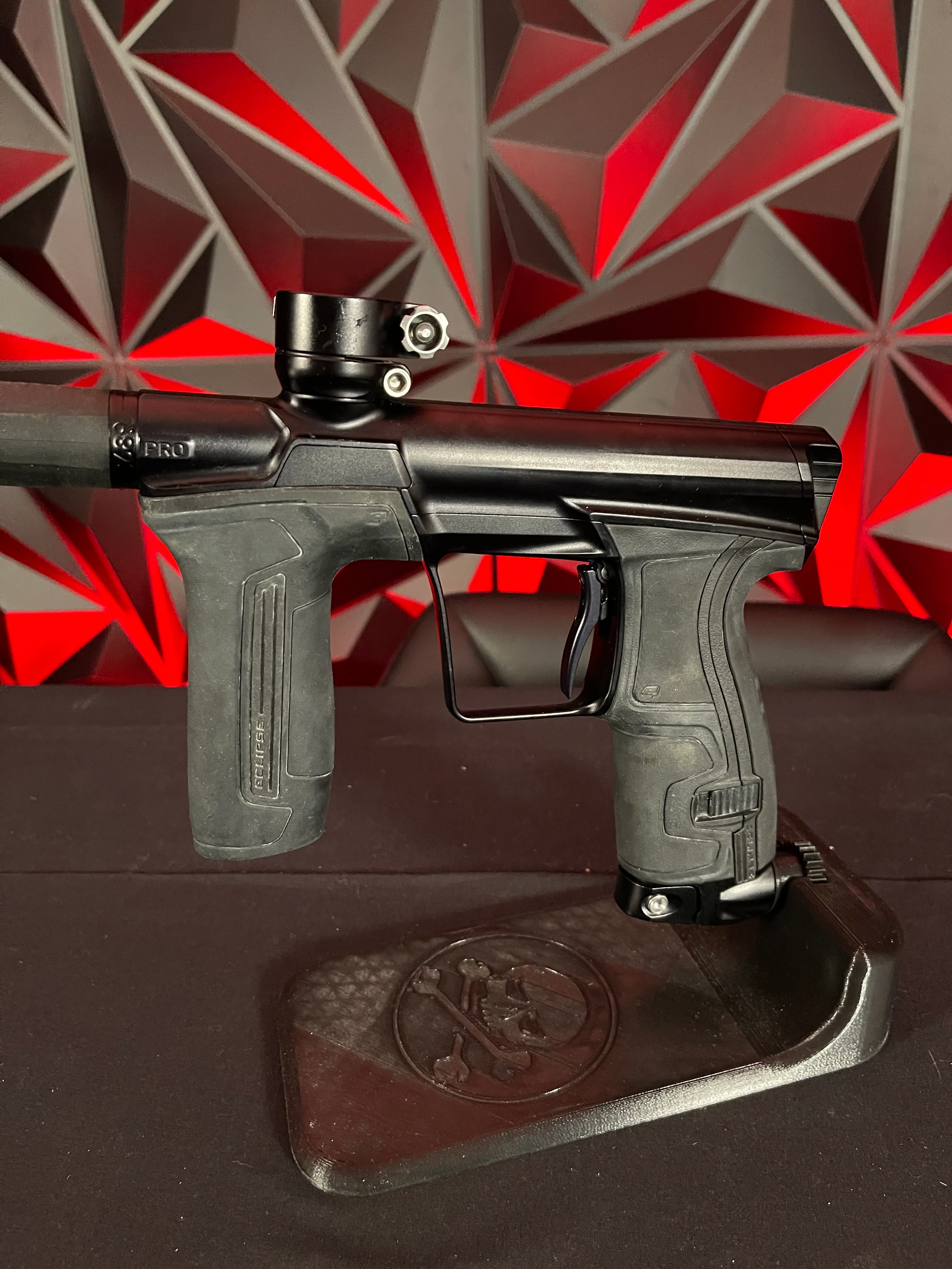 Used Planet Eclipse CS2 Pro Paintball Gun - Black w/ Gold Infamous FL Tip, 2 FL Backs, and Spare Black/White Grip Kit - Image 4