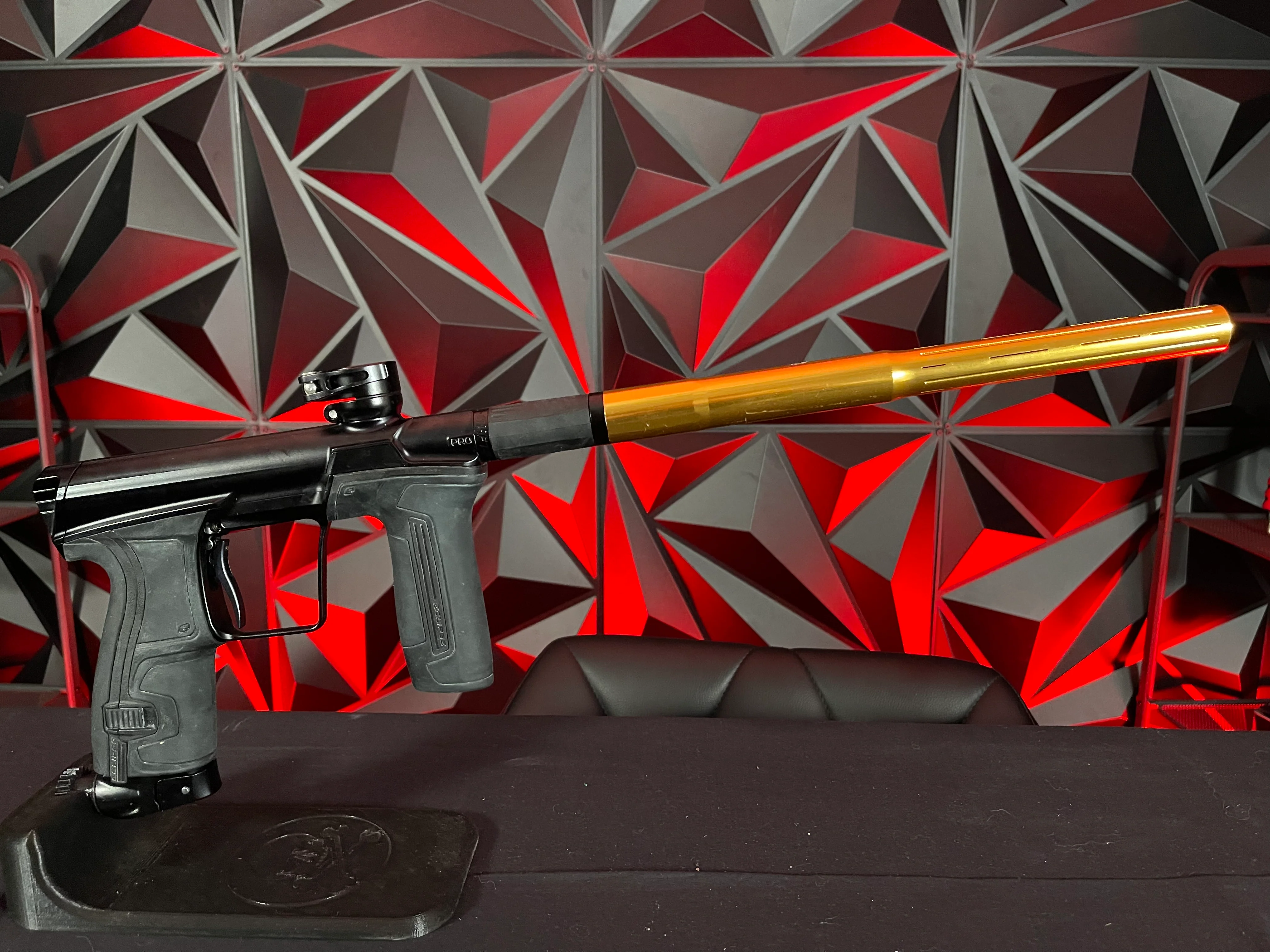 Used Planet Eclipse CS2 Pro Paintball Gun - Black w/ Gold Infamous FL Tip, 2 FL Backs, and Spare Black/White Grip Kit - Image 5