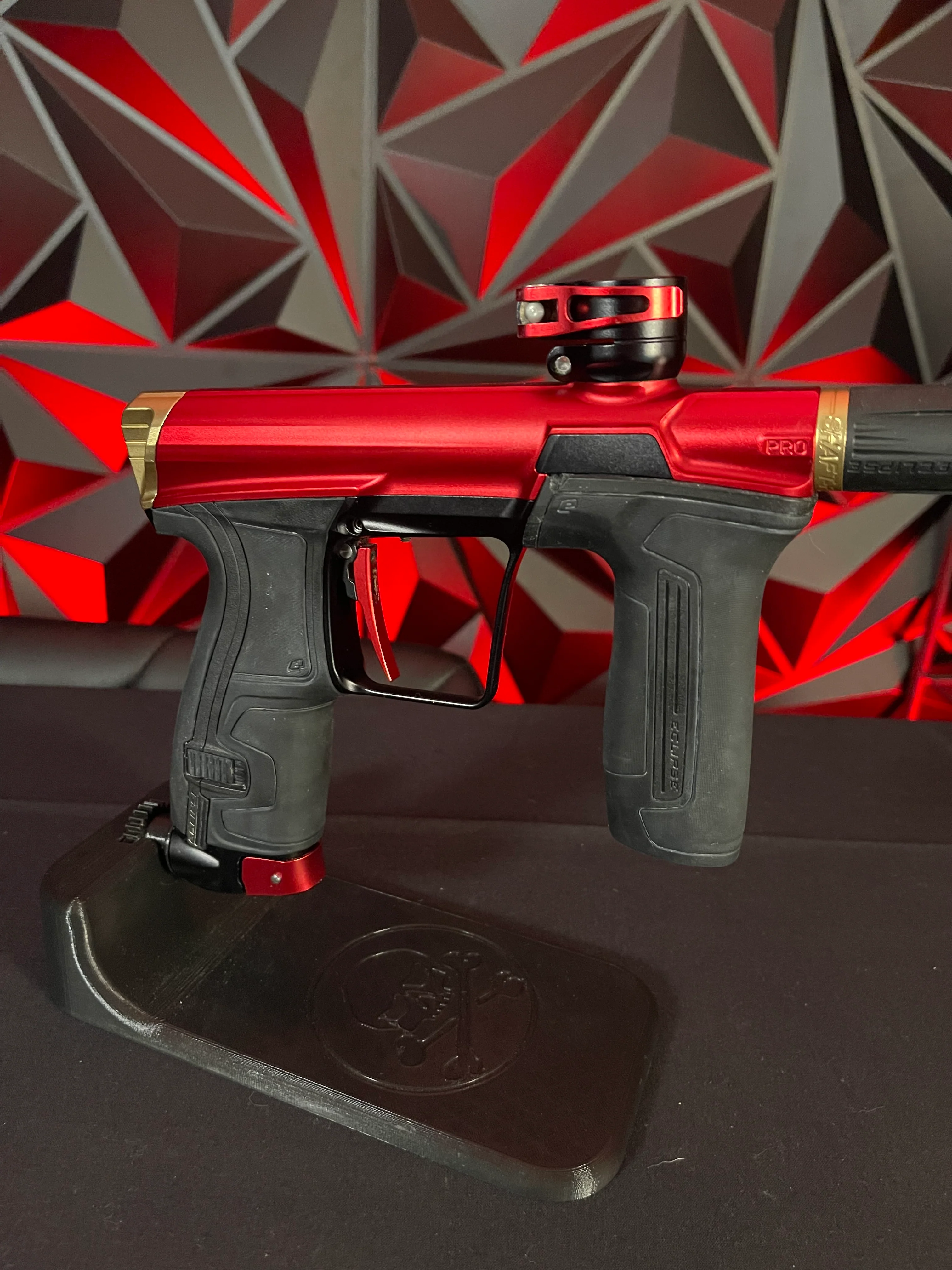 Used Planet Eclipse CS2 Pro Paintball Gun - Red/Black/Gold w/ 3 FL Backs - Image 3