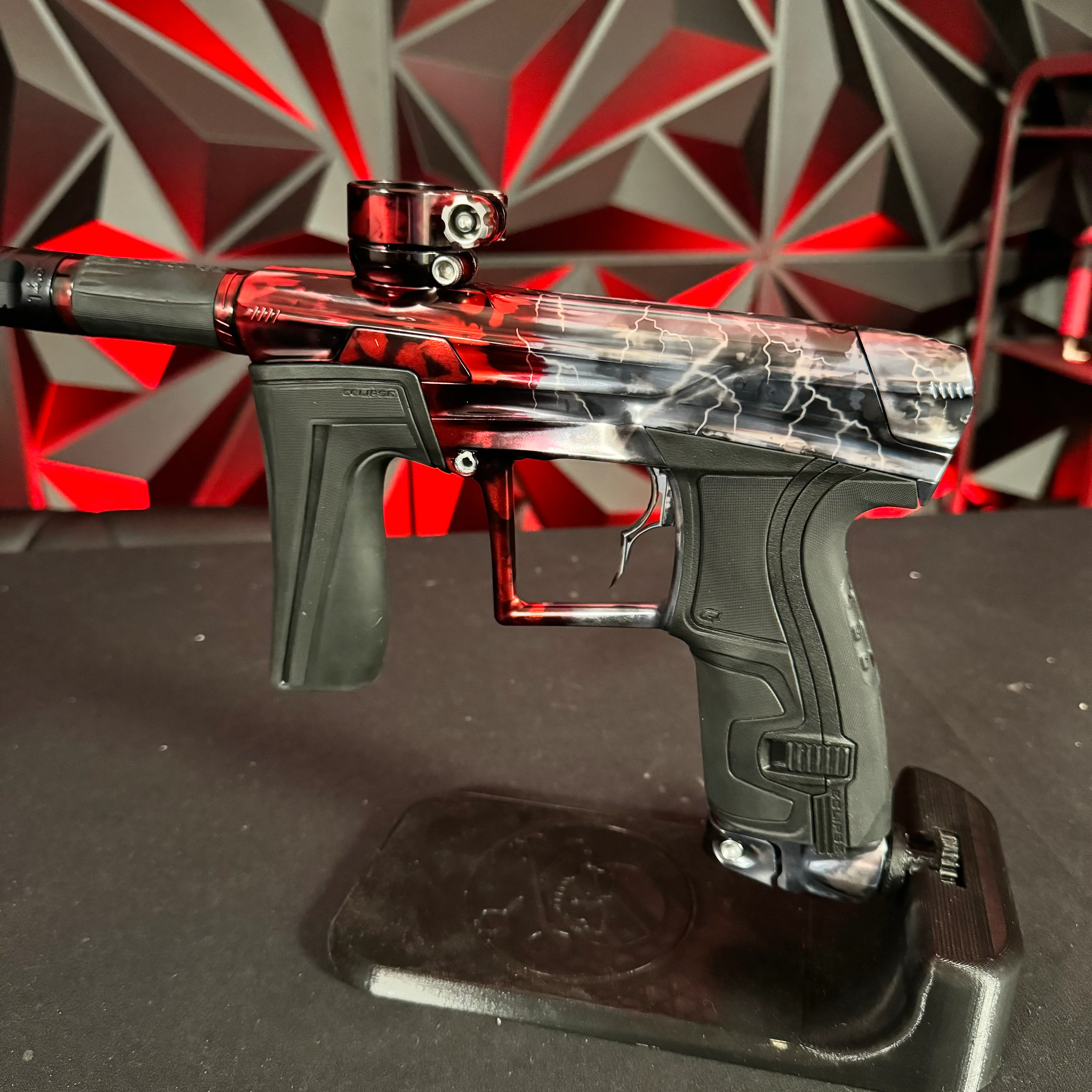 Used Planet Eclipse Geo 4 Paintball Gun - Silver/Red Acid Wash Fade w/Lightning Bolts, Infamous Trigger - Image 3