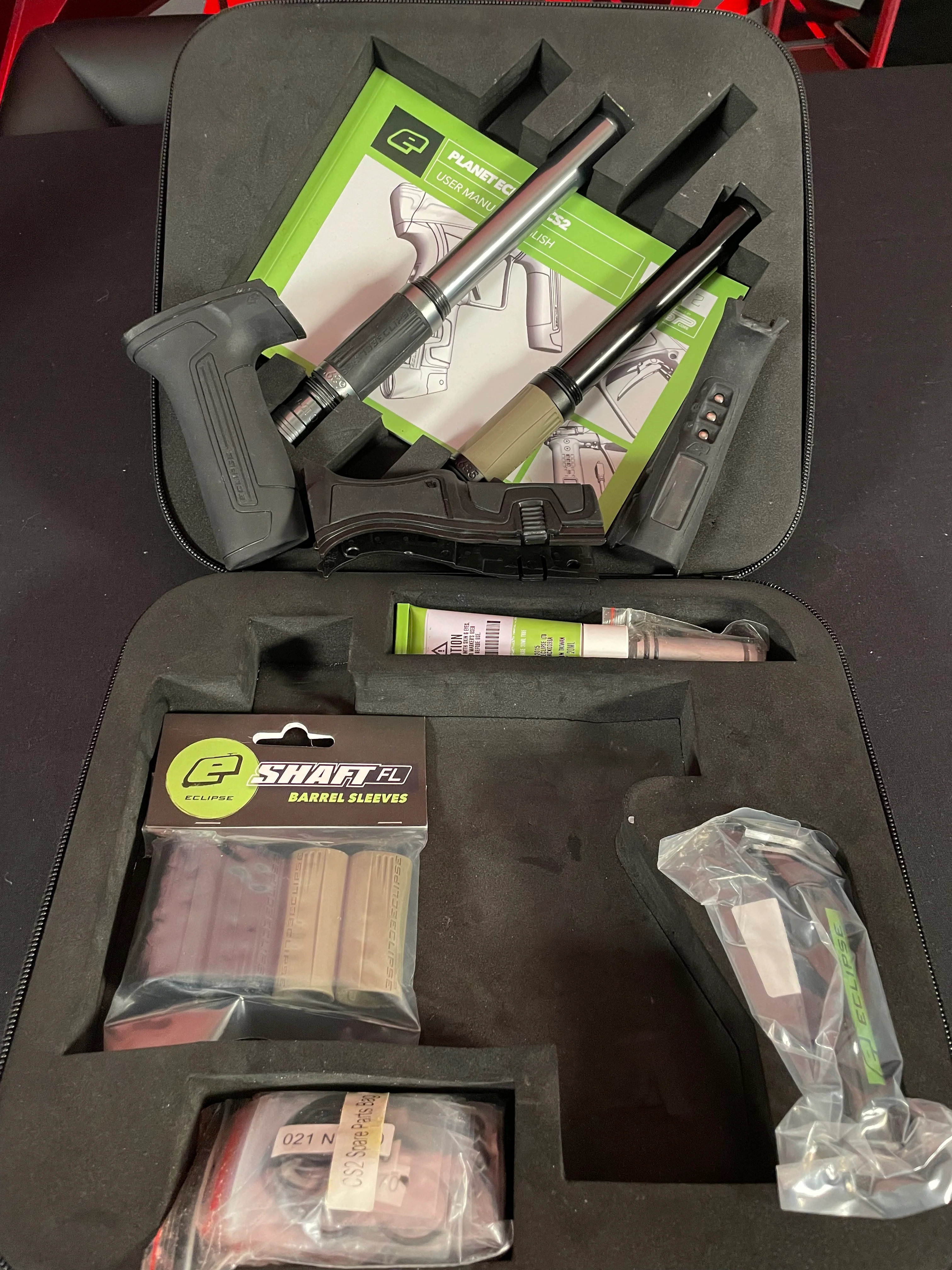 Used Planet Eclipse/Infamous CS2 Pro Paintball Gun - Dark Grey w/ 3 FL Backs, Earth Grip Kit, Black Grip Kit, and Earth Barrel Grips - Image 8