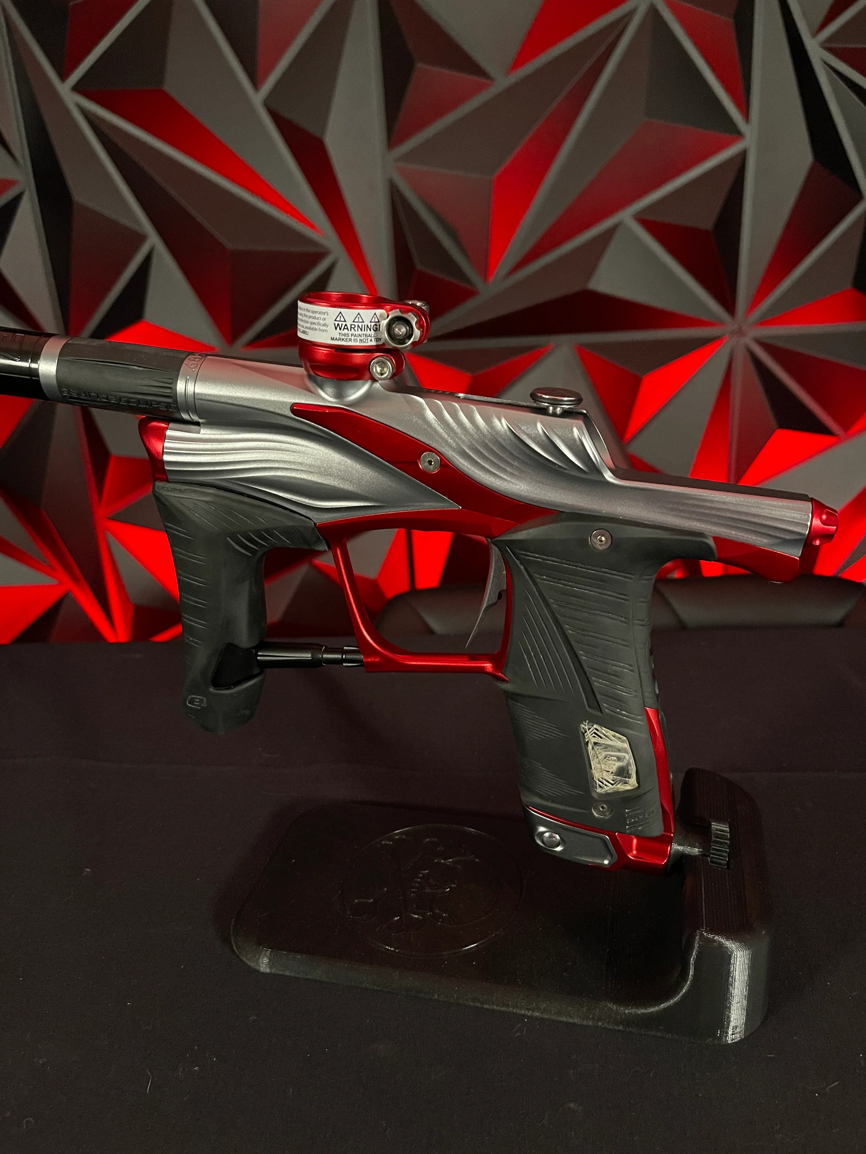 Used Planet Eclipse LV1.6 Paintball Gun - Teahupo Silver/Red w/Deuce Trigger, SSC Bolt, SSC Spare Parts Kit - Image 2