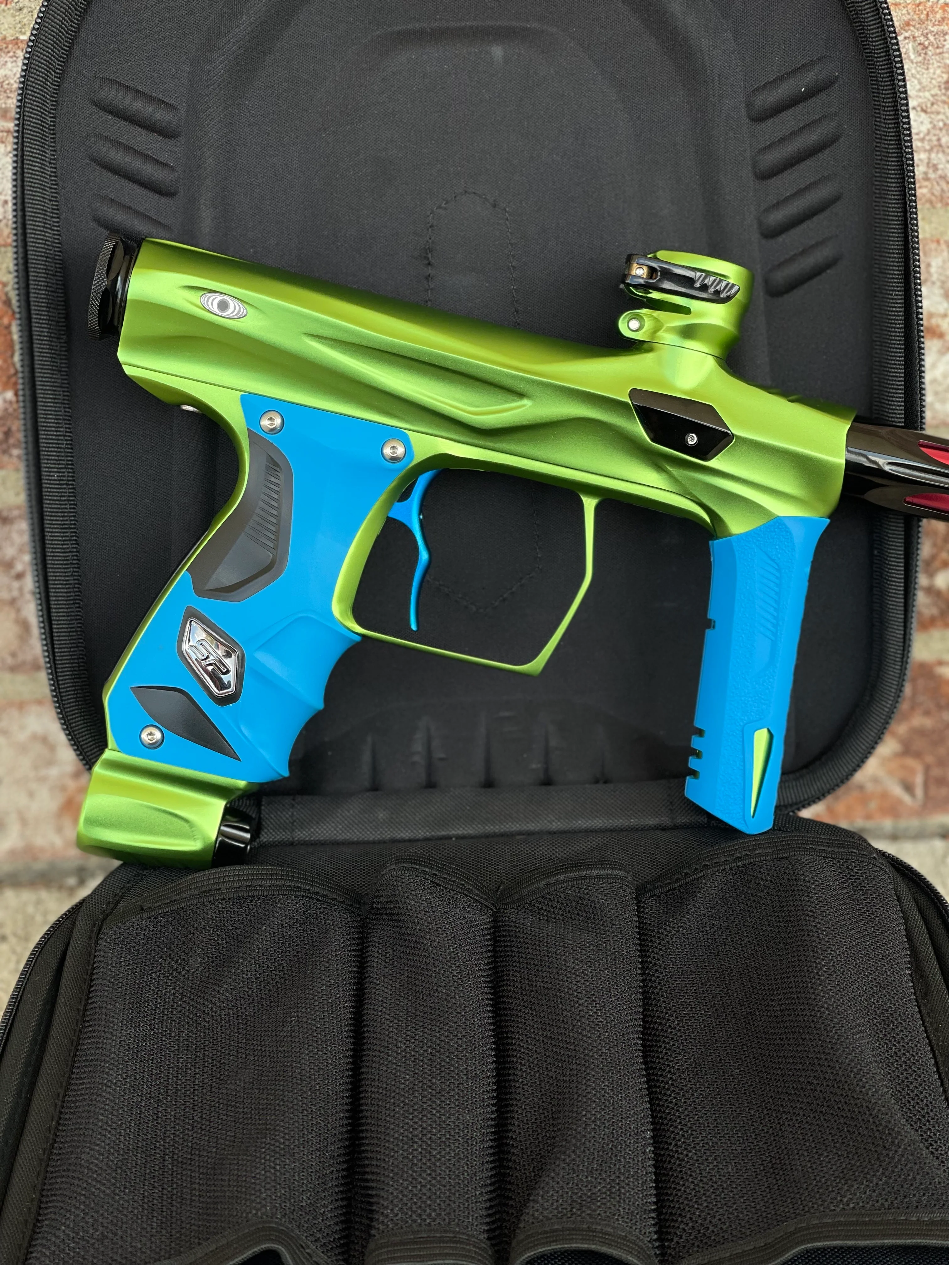 Used Shocker Amp Paintball Gun - Green/Black with Infamous Deuce Trigger and Blue Grips - Image 5