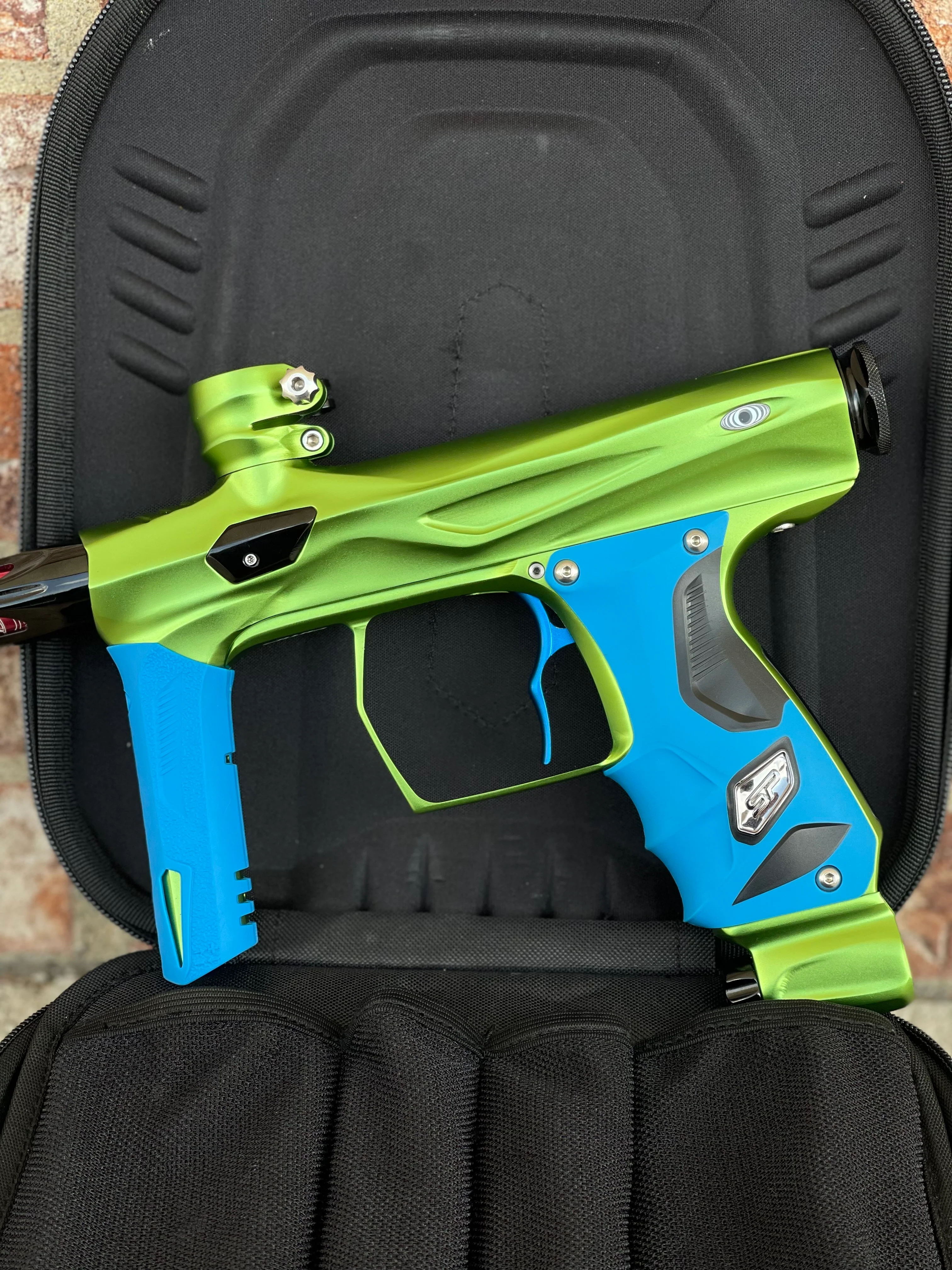 Used Shocker Amp Paintball Gun - Green/Black with Infamous Deuce Trigger and Blue Grips - Image 6