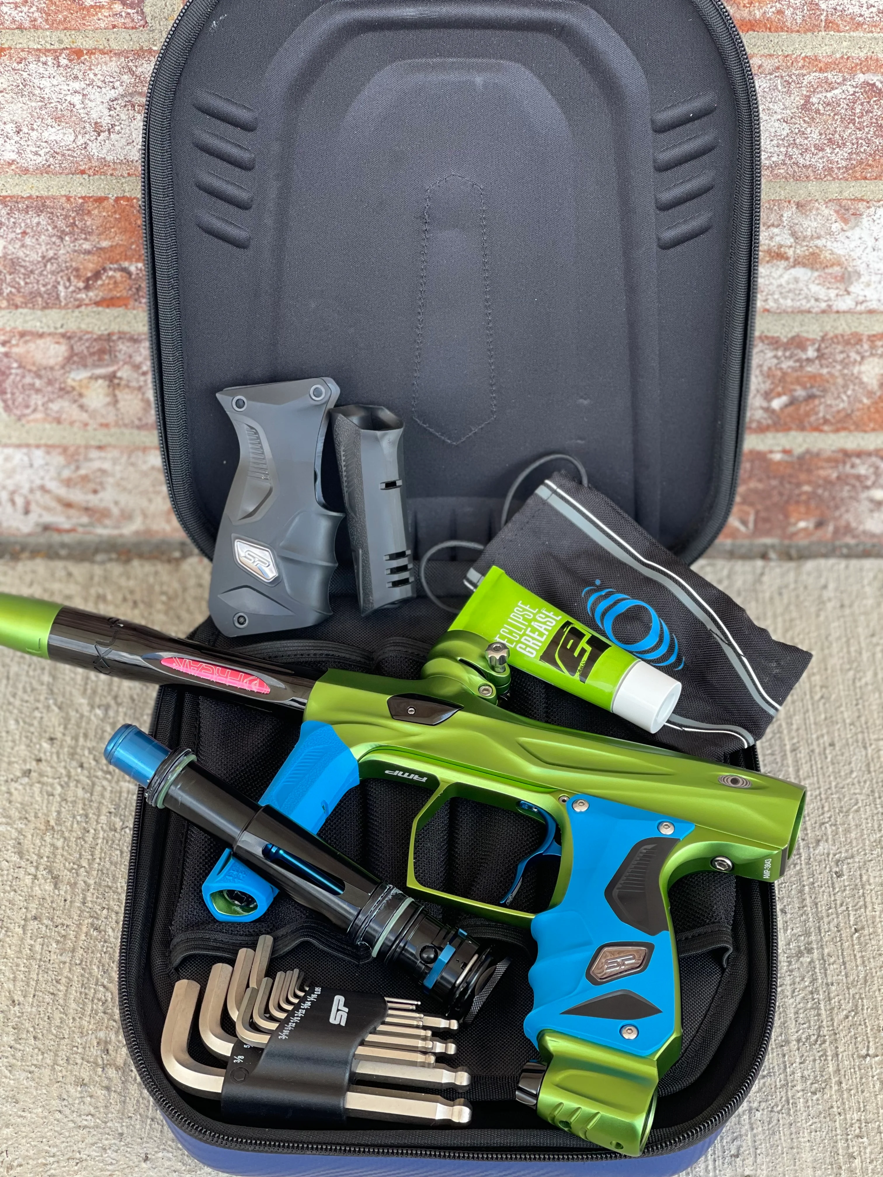 Used Shocker Amp Paintball Gun - Green/Black with Infamous Deuce Trigger and Blue Grips - Image 7