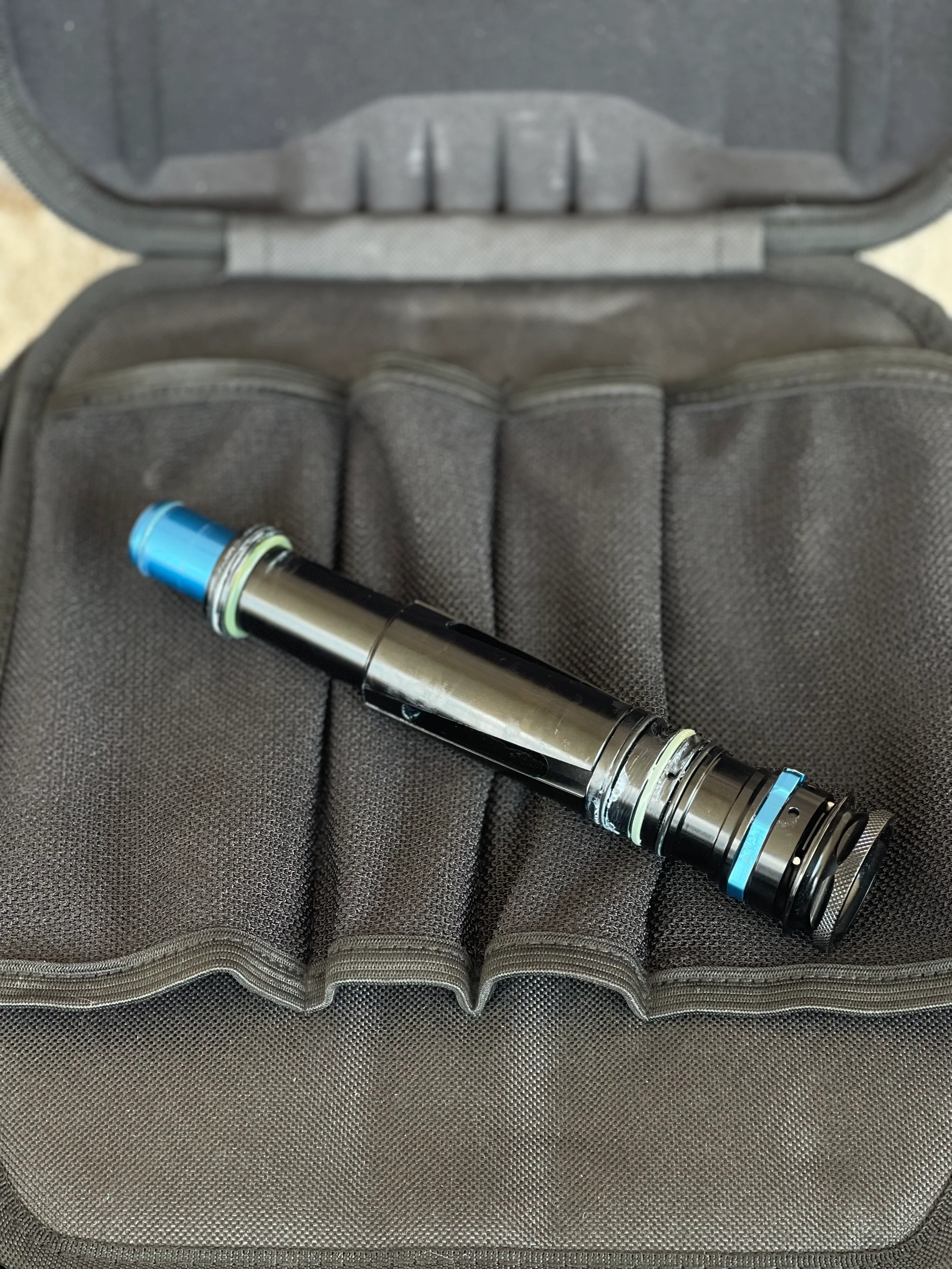 Used Shocker Amp Paintball Gun - Green/Black with Infamous Deuce Trigger and Blue Grips - Image 9
