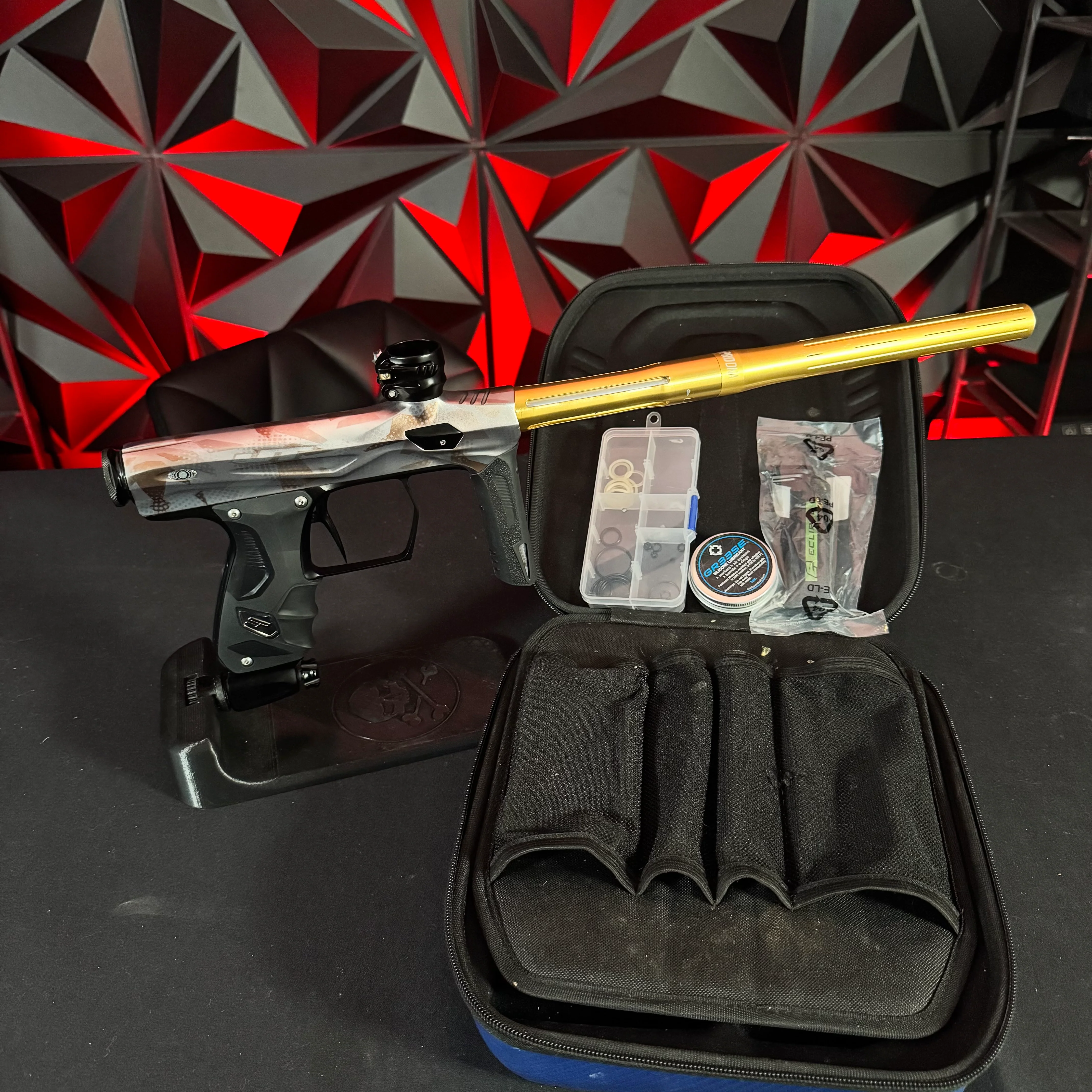 Used Shocker Amp Paintball Gun - JT Camo w/Black Parts & Polished Gold Infamous FXL Barrel
