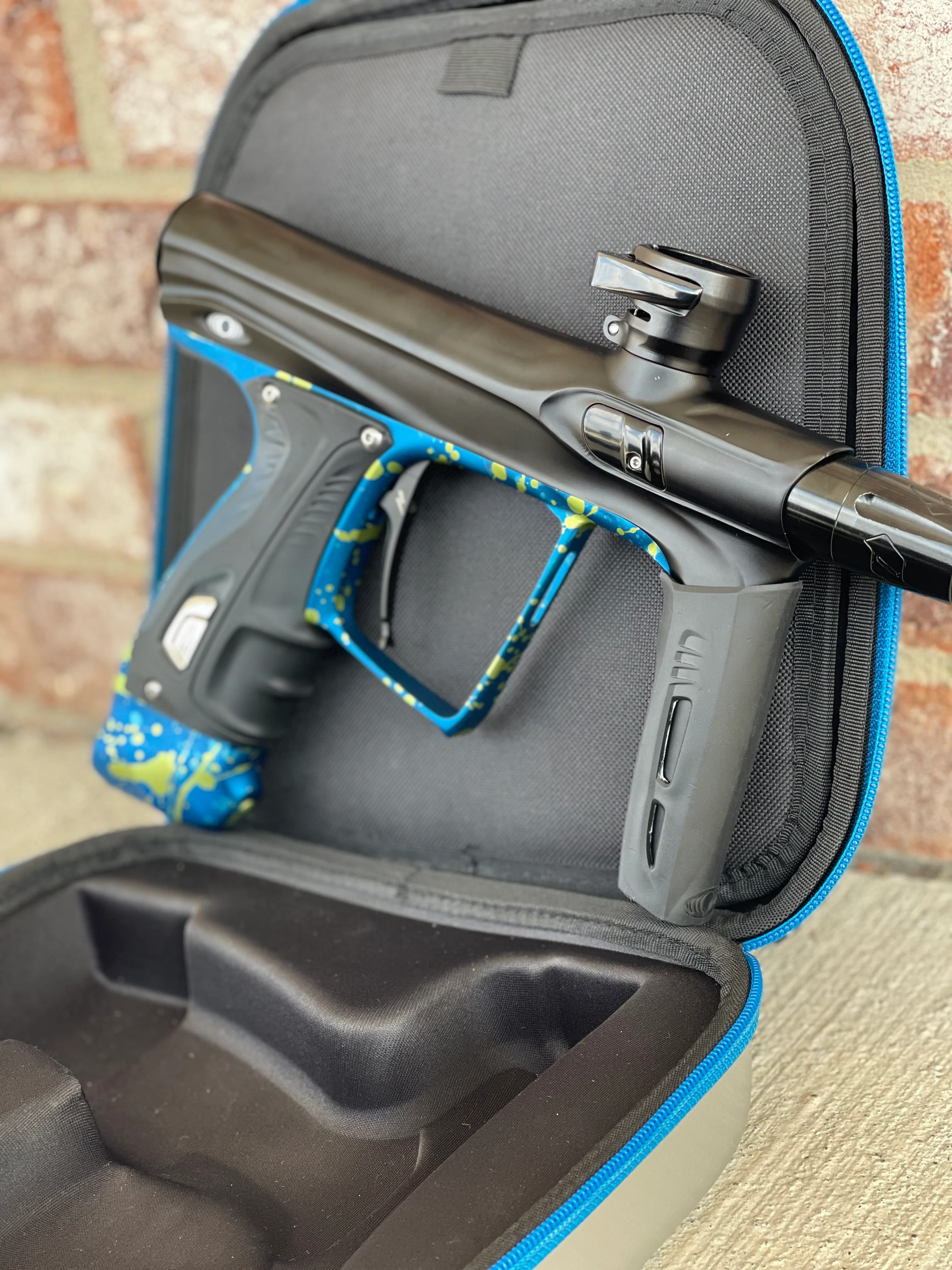 Used Shocker XLS Paintball Gun - Black with Blue Green Splash Trigger Frame and CVO Frame - Image 3