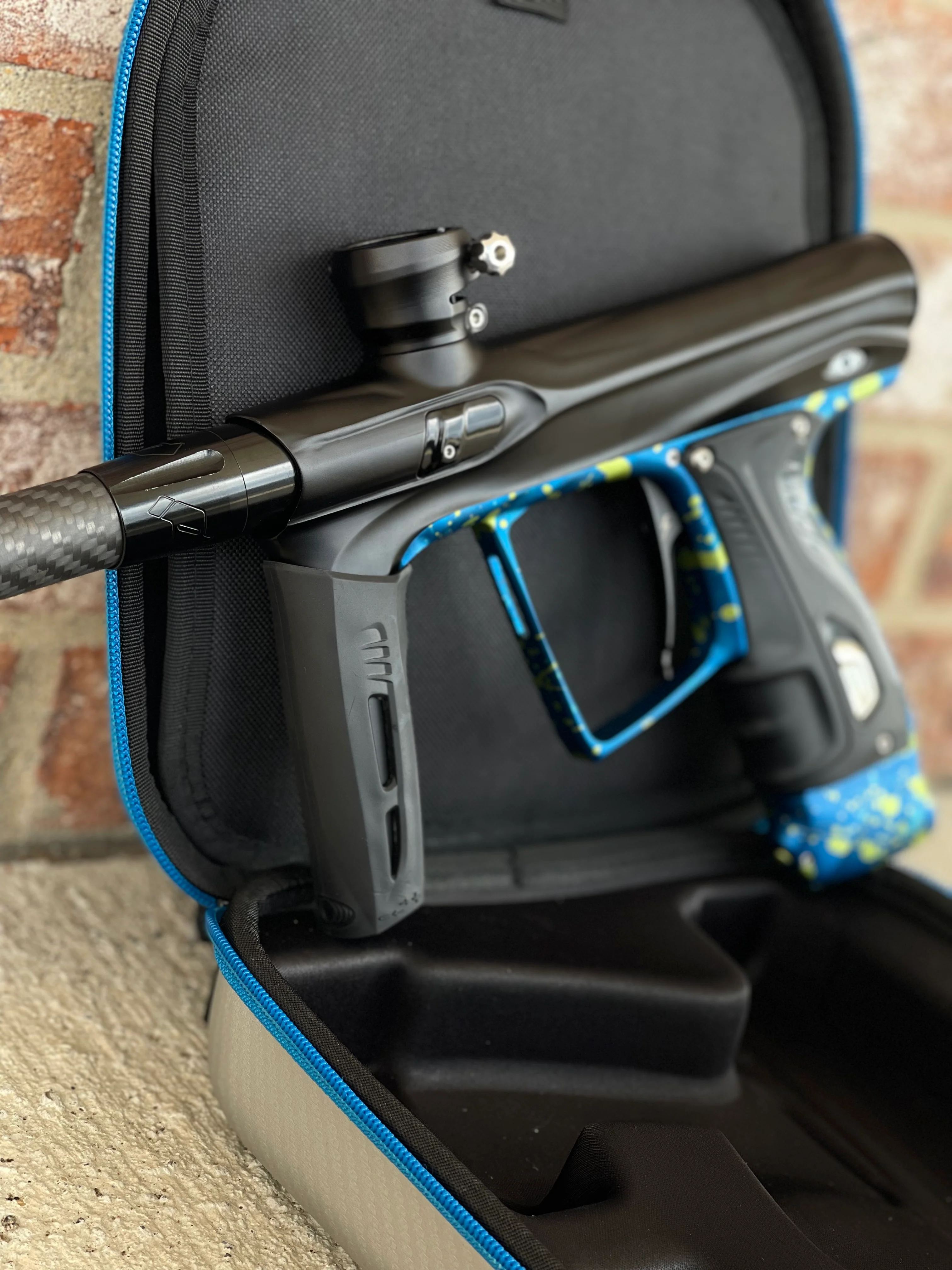 Used Shocker XLS Paintball Gun - Black with Blue Green Splash Trigger Frame and CVO Frame - Image 4
