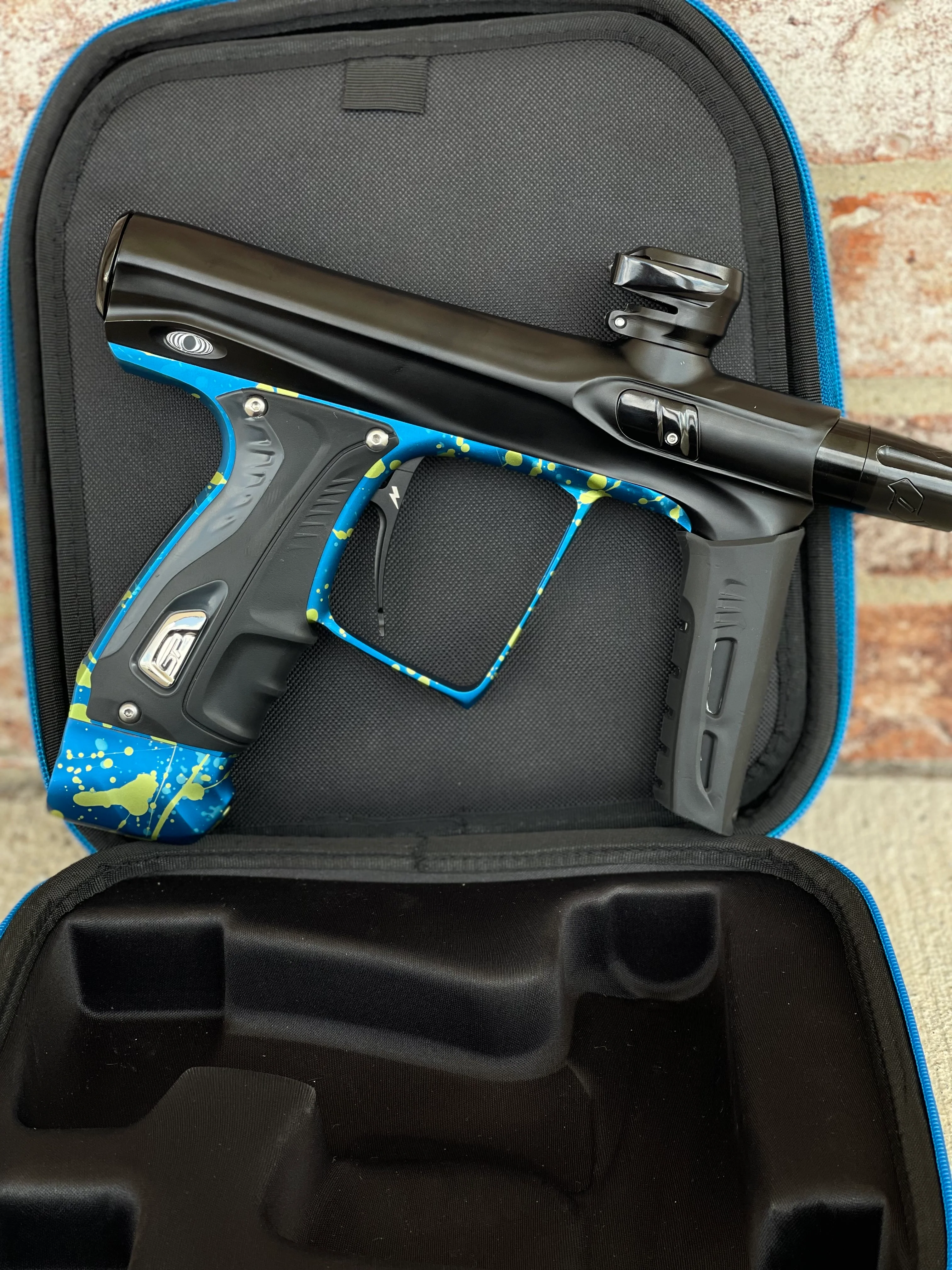Used Shocker XLS Paintball Gun - Black with Blue Green Splash Trigger Frame and CVO Frame - Image 5