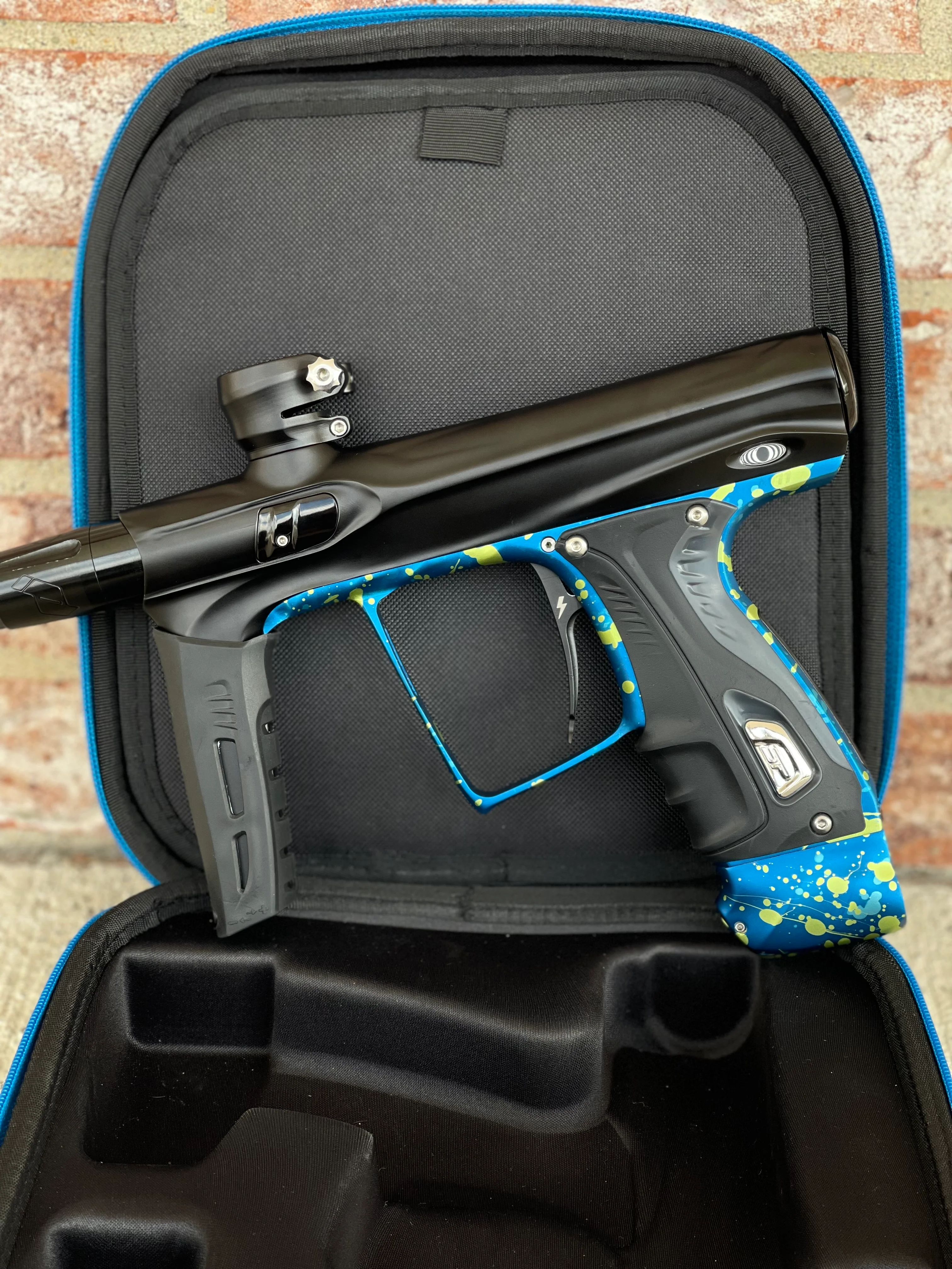 Used Shocker XLS Paintball Gun - Black with Blue Green Splash Trigger Frame and CVO Frame - Image 6