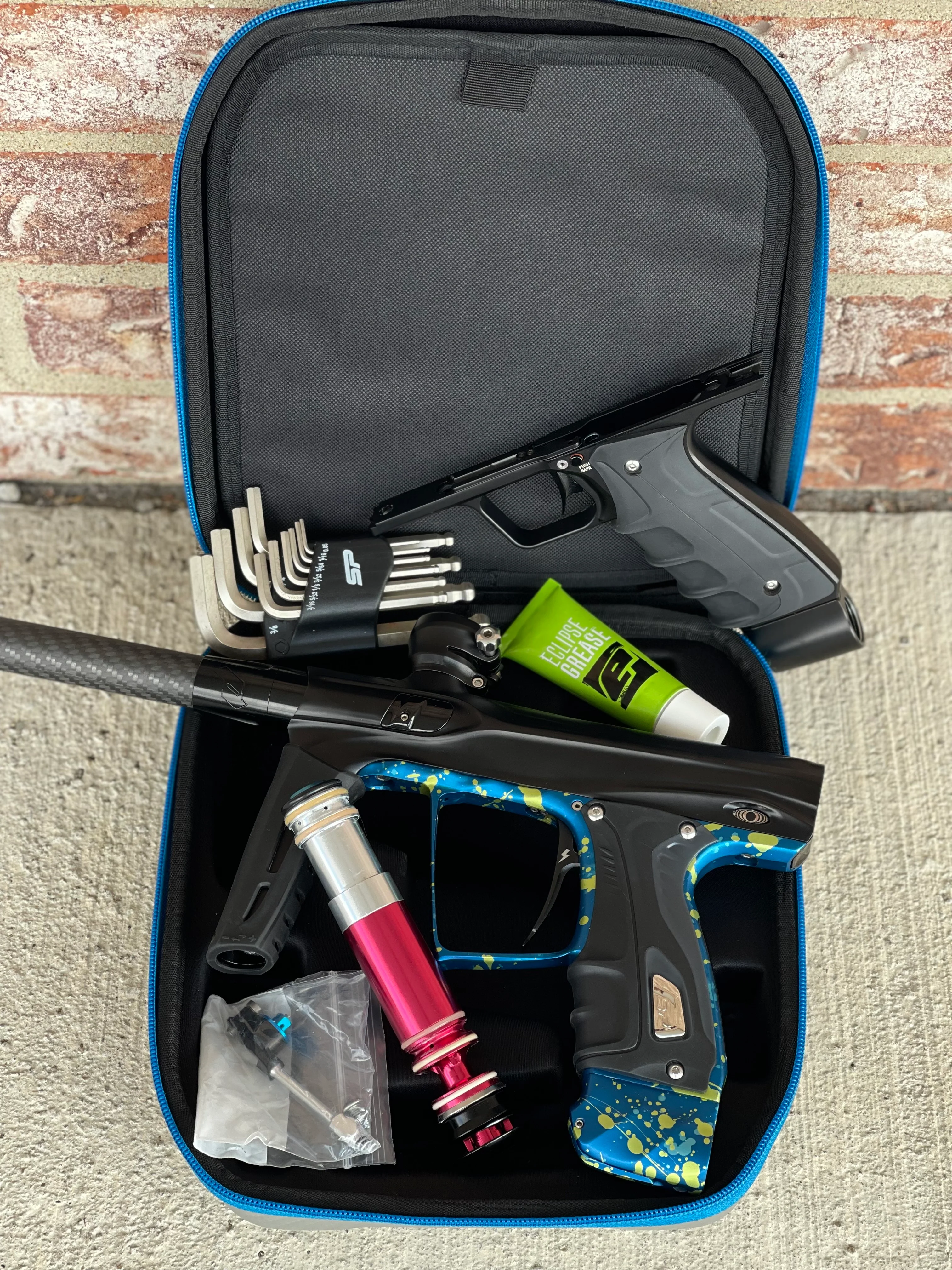 Used Shocker XLS Paintball Gun - Black with Blue Green Splash Trigger Frame and CVO Frame - Image 7