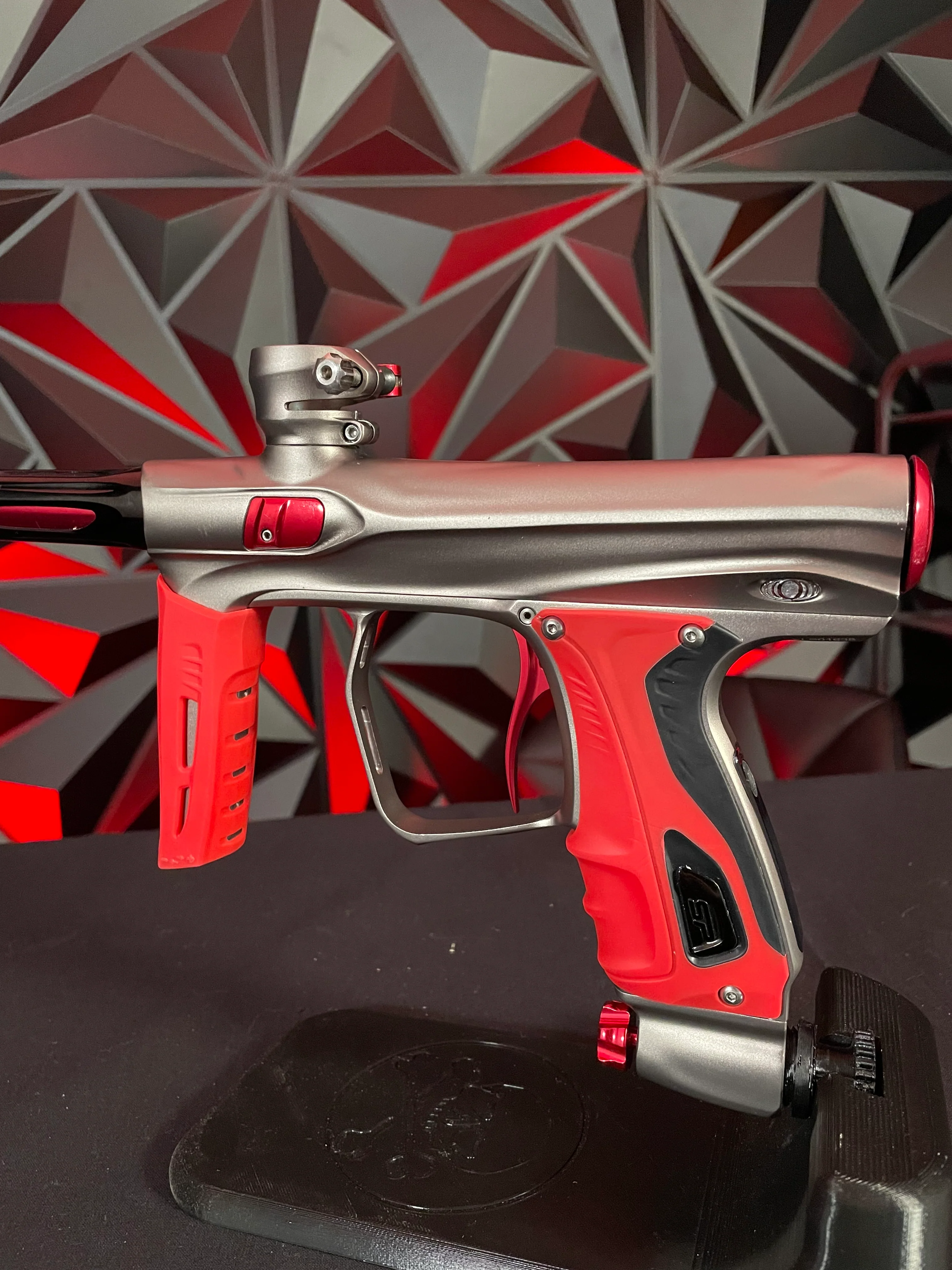 Used Shocker XLS Paintball Gun - Pewter/Red w/ Red Grip Kit - Image 2