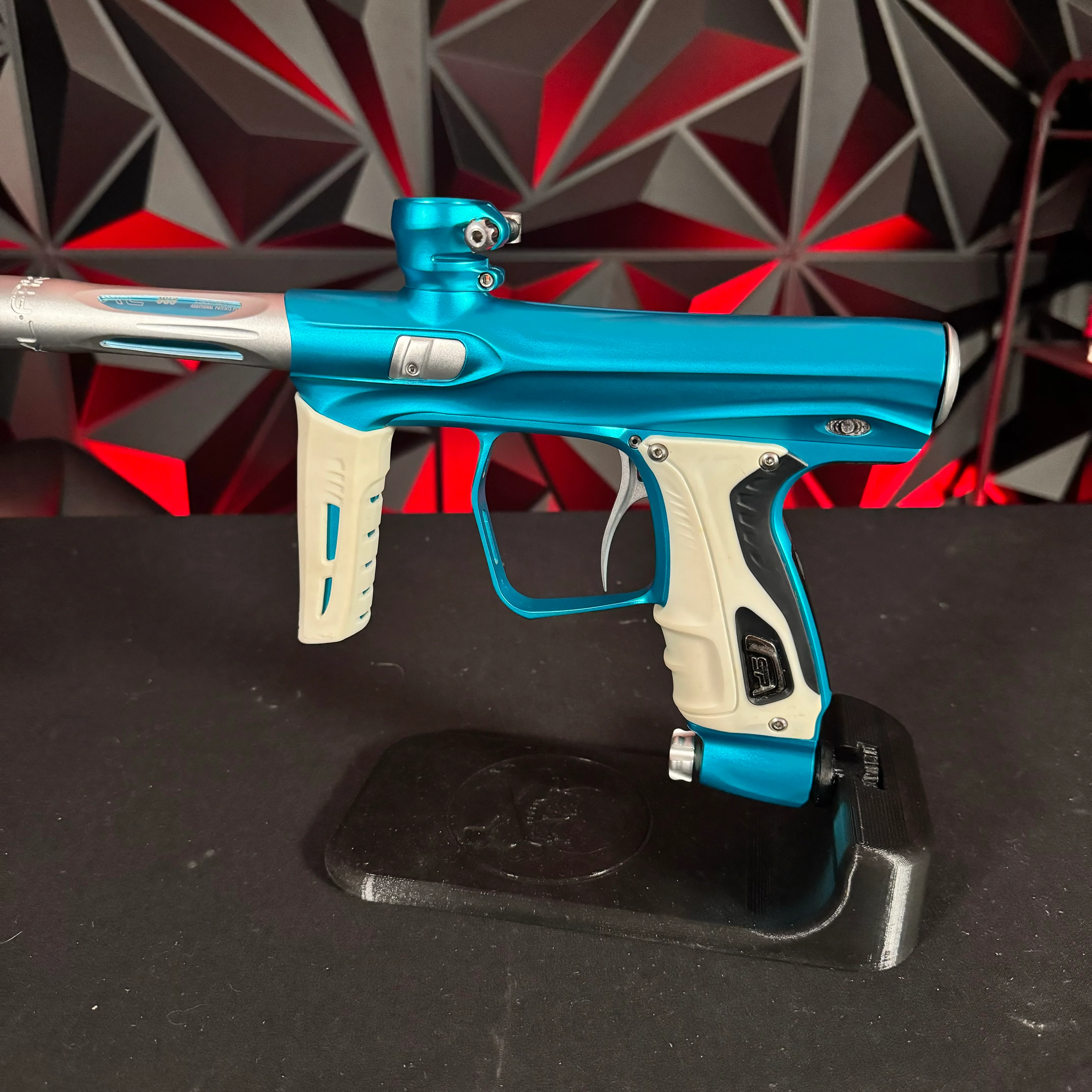Used Shocker XLS Paintball Gun - Teal/Silver w/White Grip Kit - Image 3