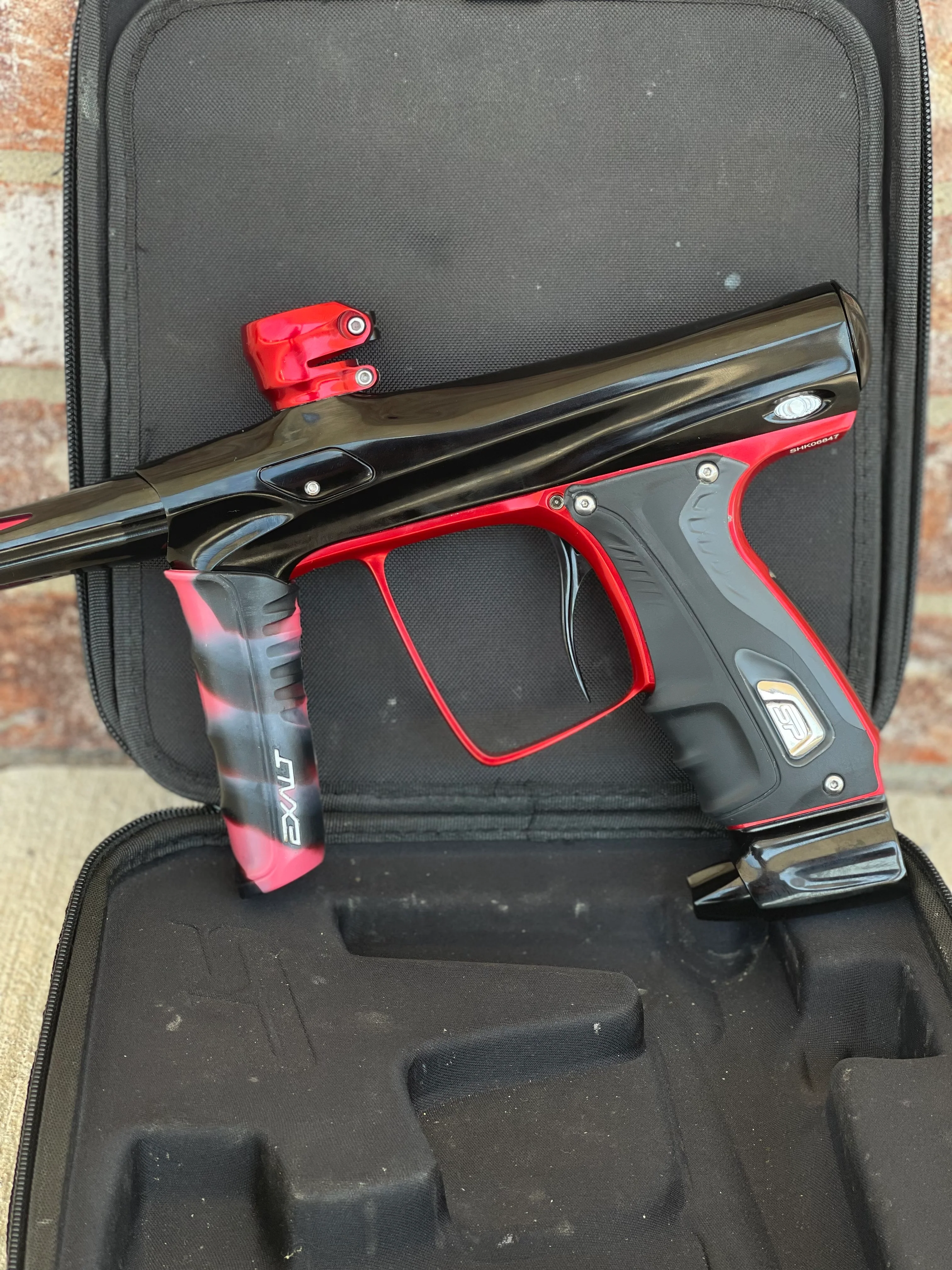 Used Smart Parts Shocker RSX Paintball Marker- Gloss Black w/Red Accents and Red/Black Swirl Exalt Front Grip - Image 4
