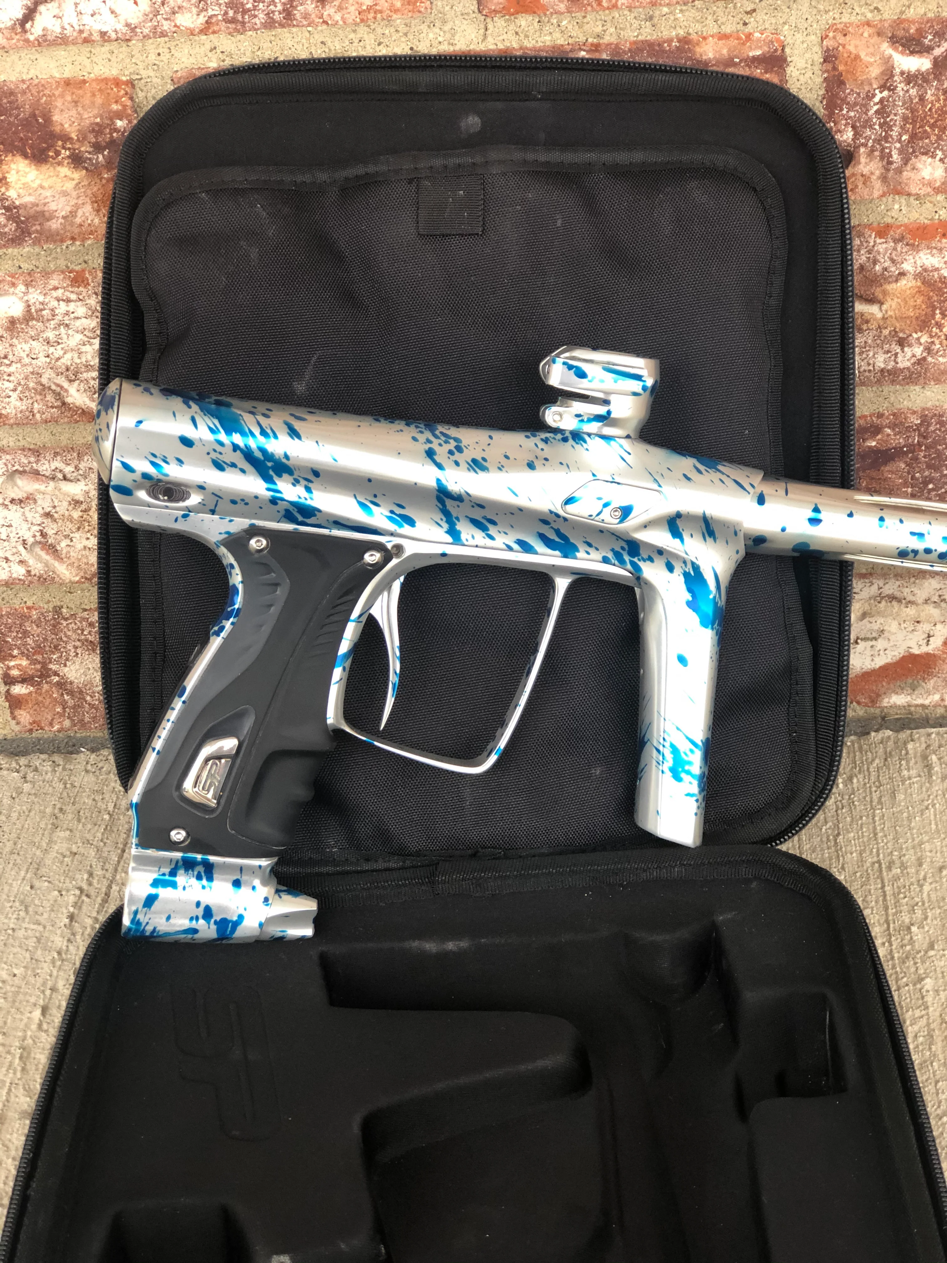 Used SP Shocker RSX Paintball Gun - Silver/Blue Splash - Image 2